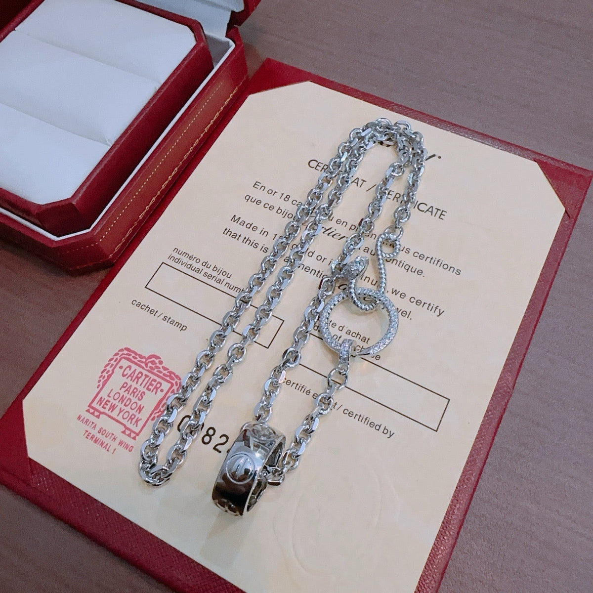 Martin Graham pendant necklace in polished metal-tone