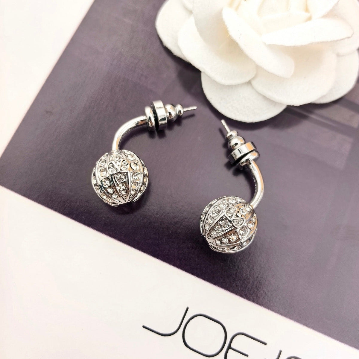Martin Graham earrings in polished metal-tone