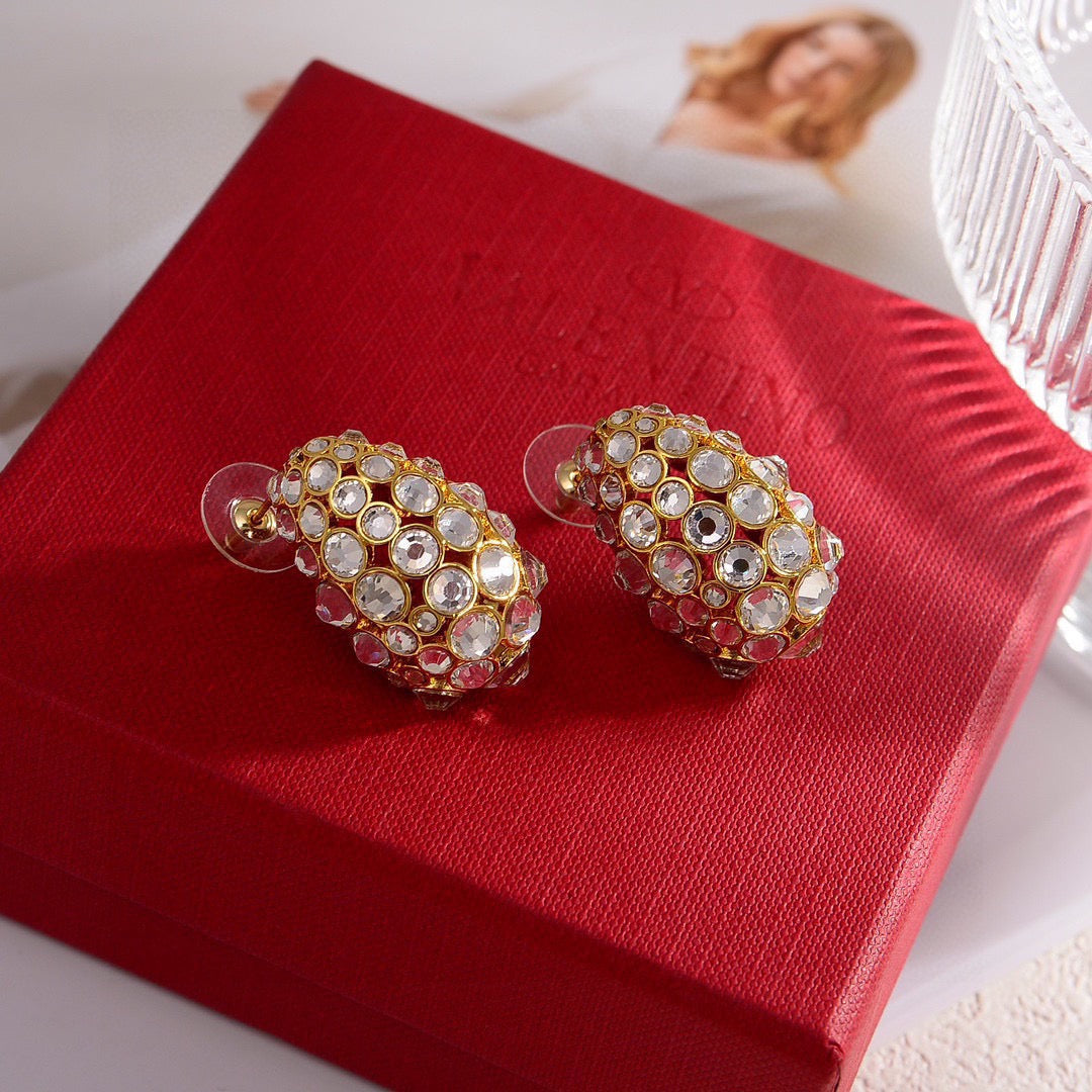 Martin Graham stud earrings in polished metal-tone