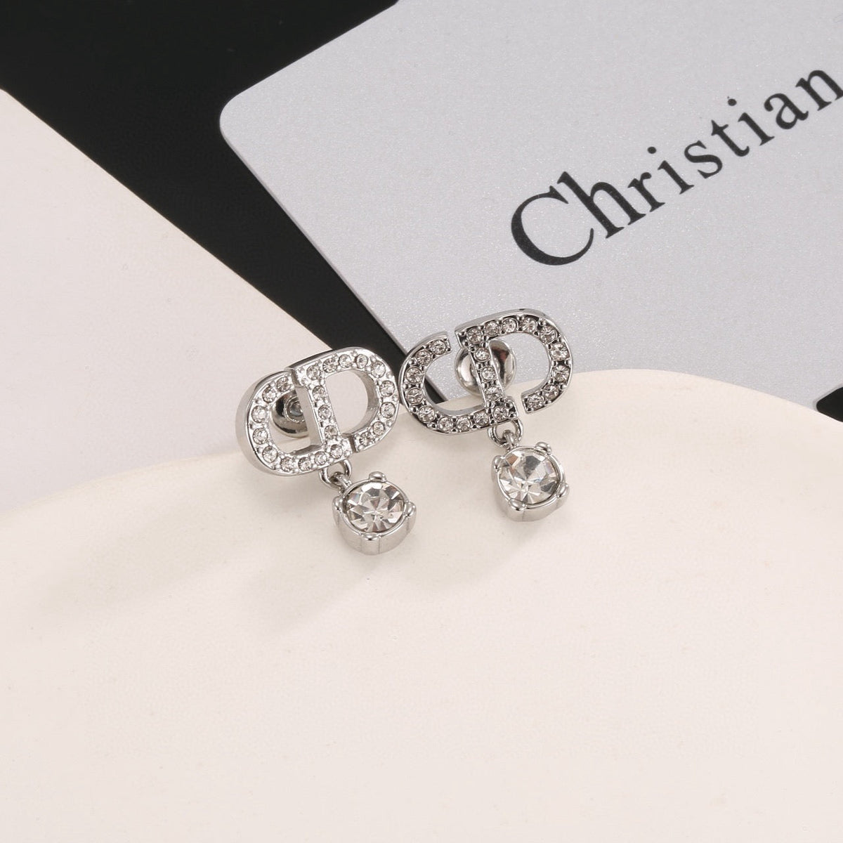 Martin Graham stud earrings in polished metal-tone