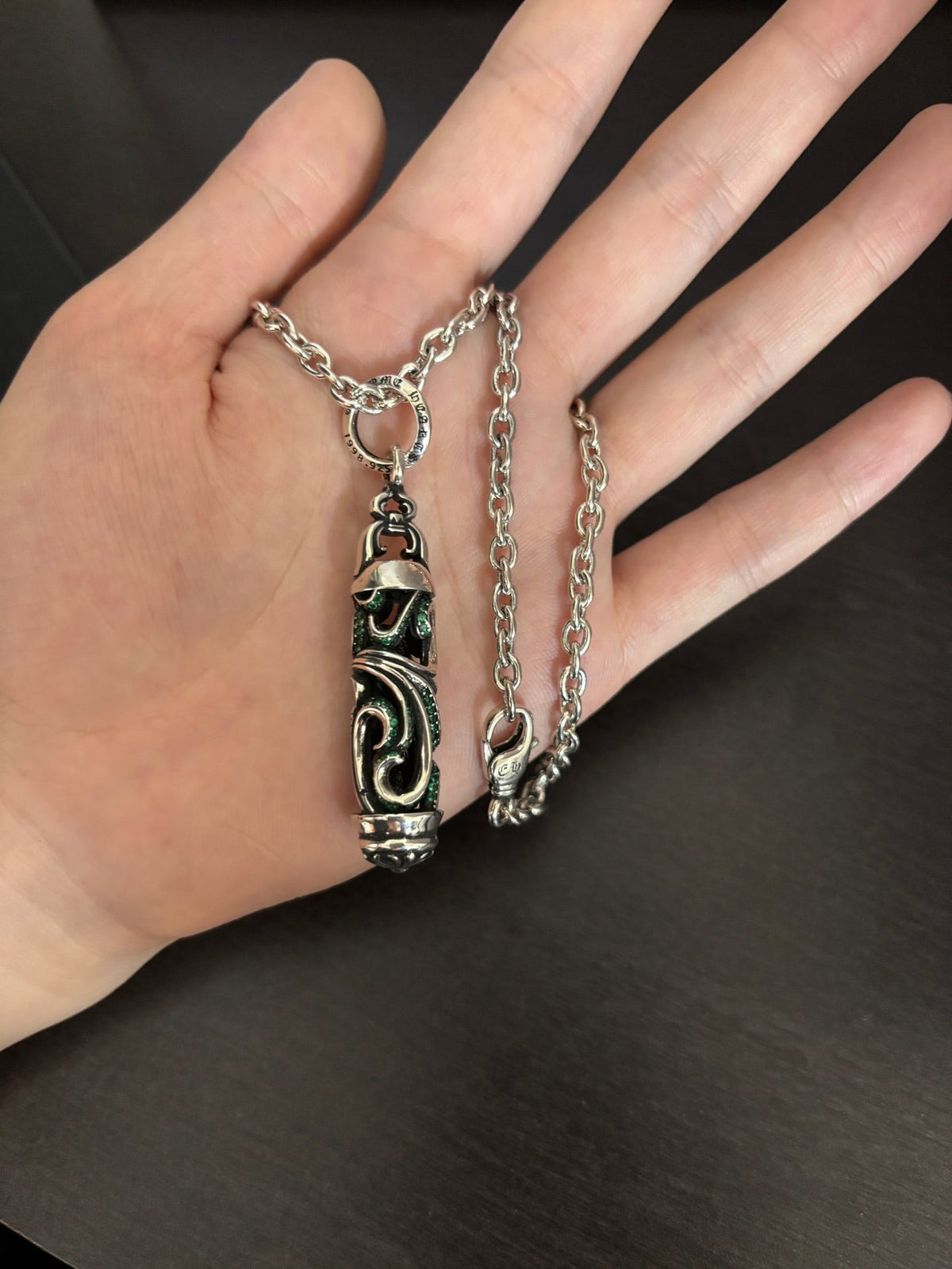 Martin Graham pendant necklace in polished metal-tone – close-up detail