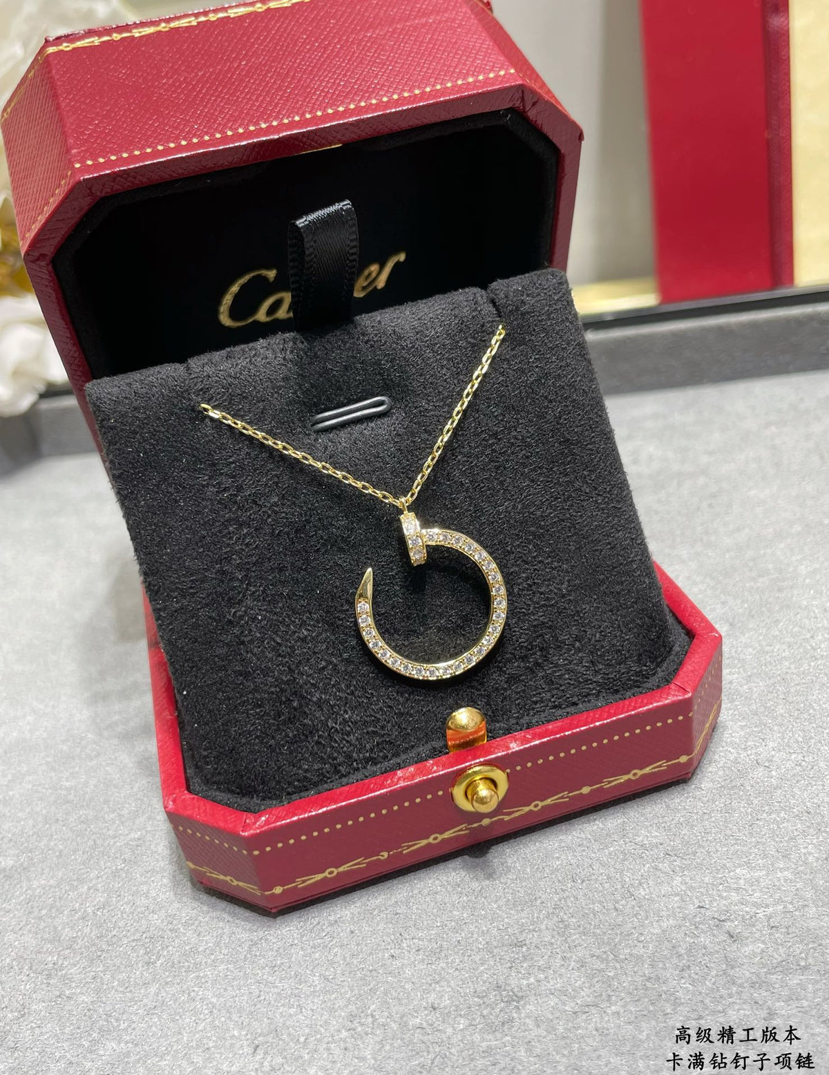 Martin Graham pendant necklace in polished metal-tone