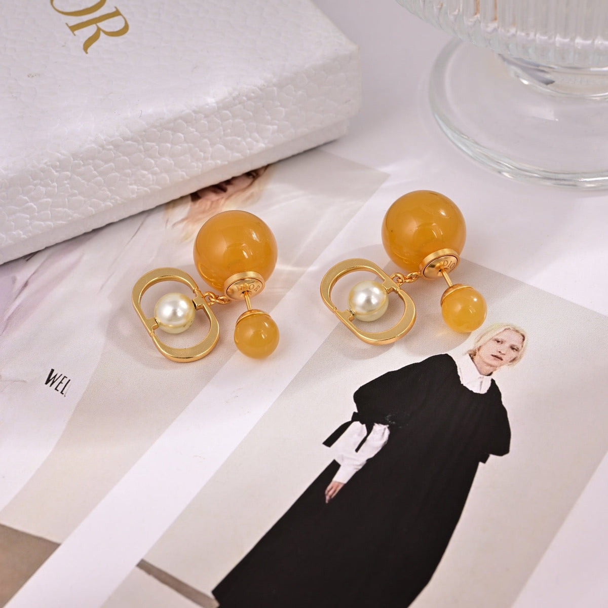 Martin Graham earrings in polished metal-tone
