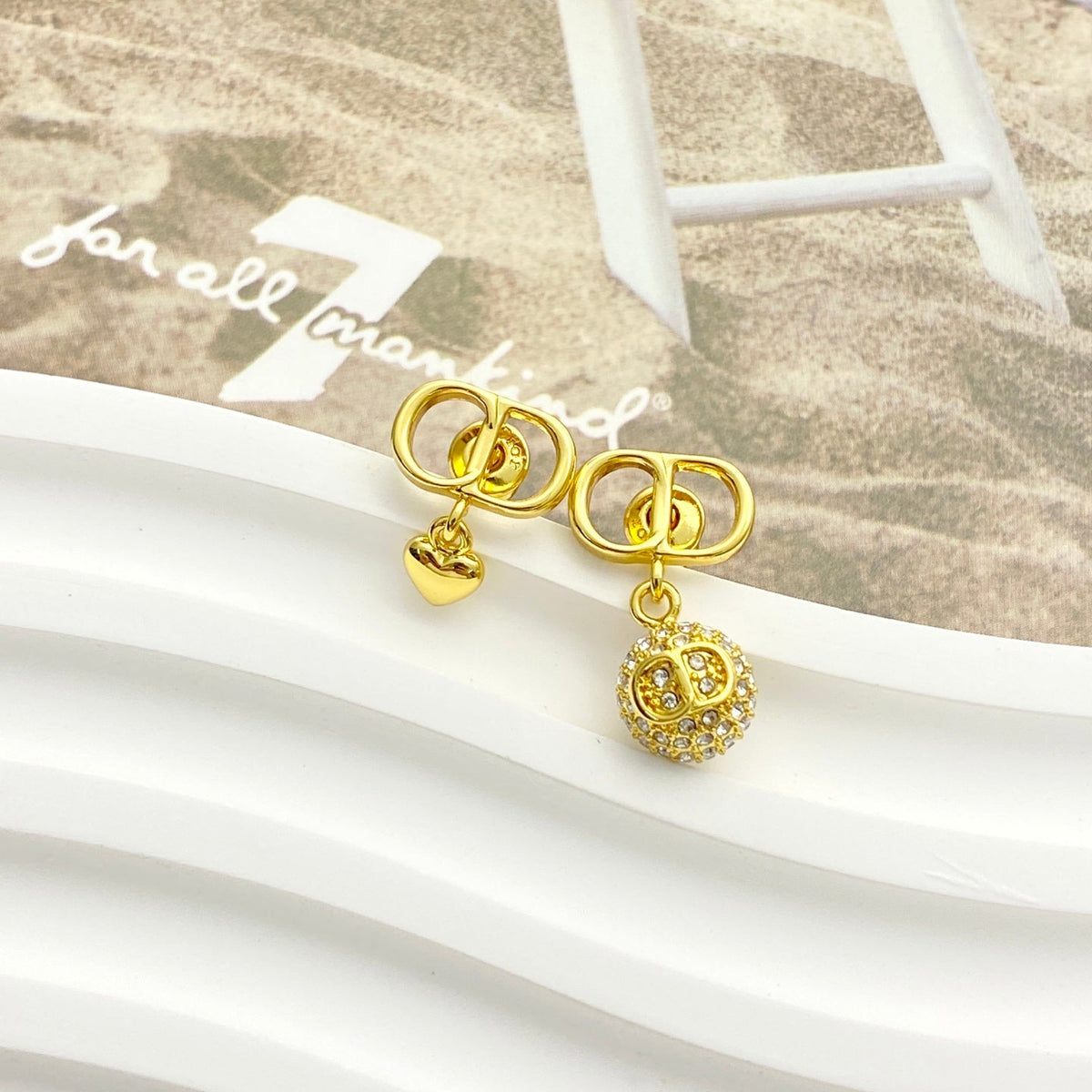 Martin Graham stud earrings in polished metal-tone