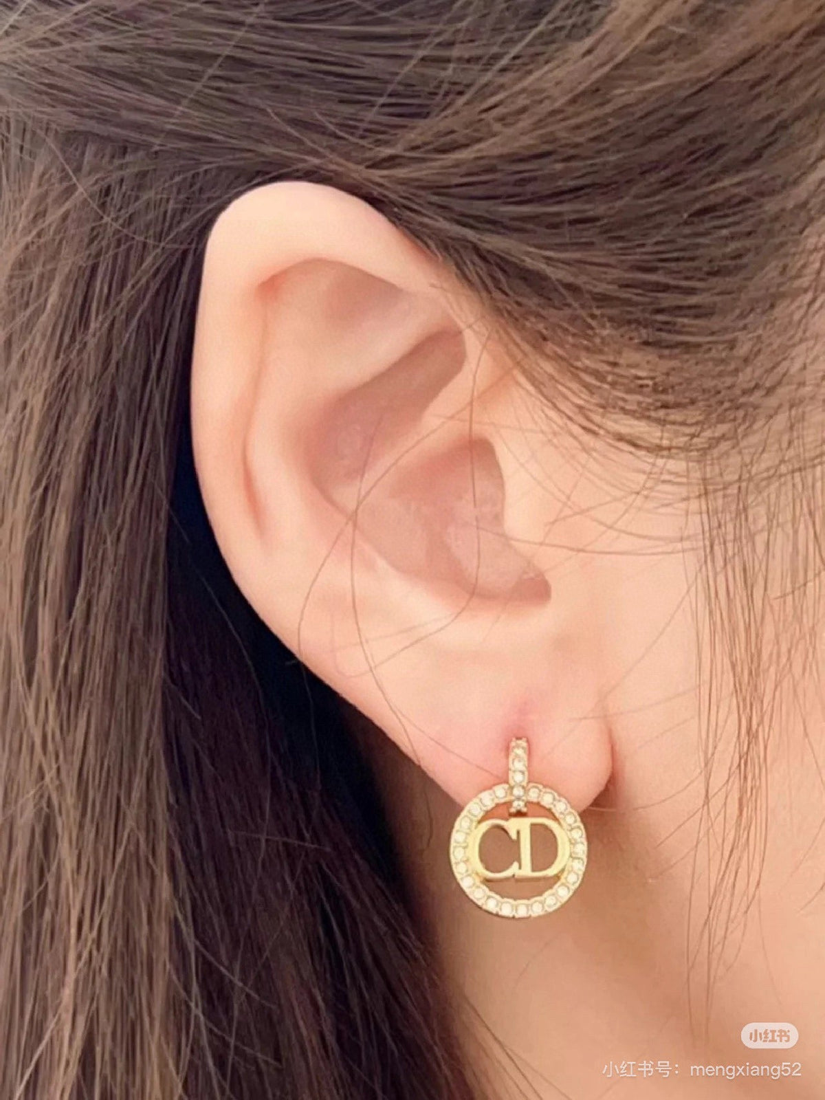 Martin Graham earrings in polished metal-tone