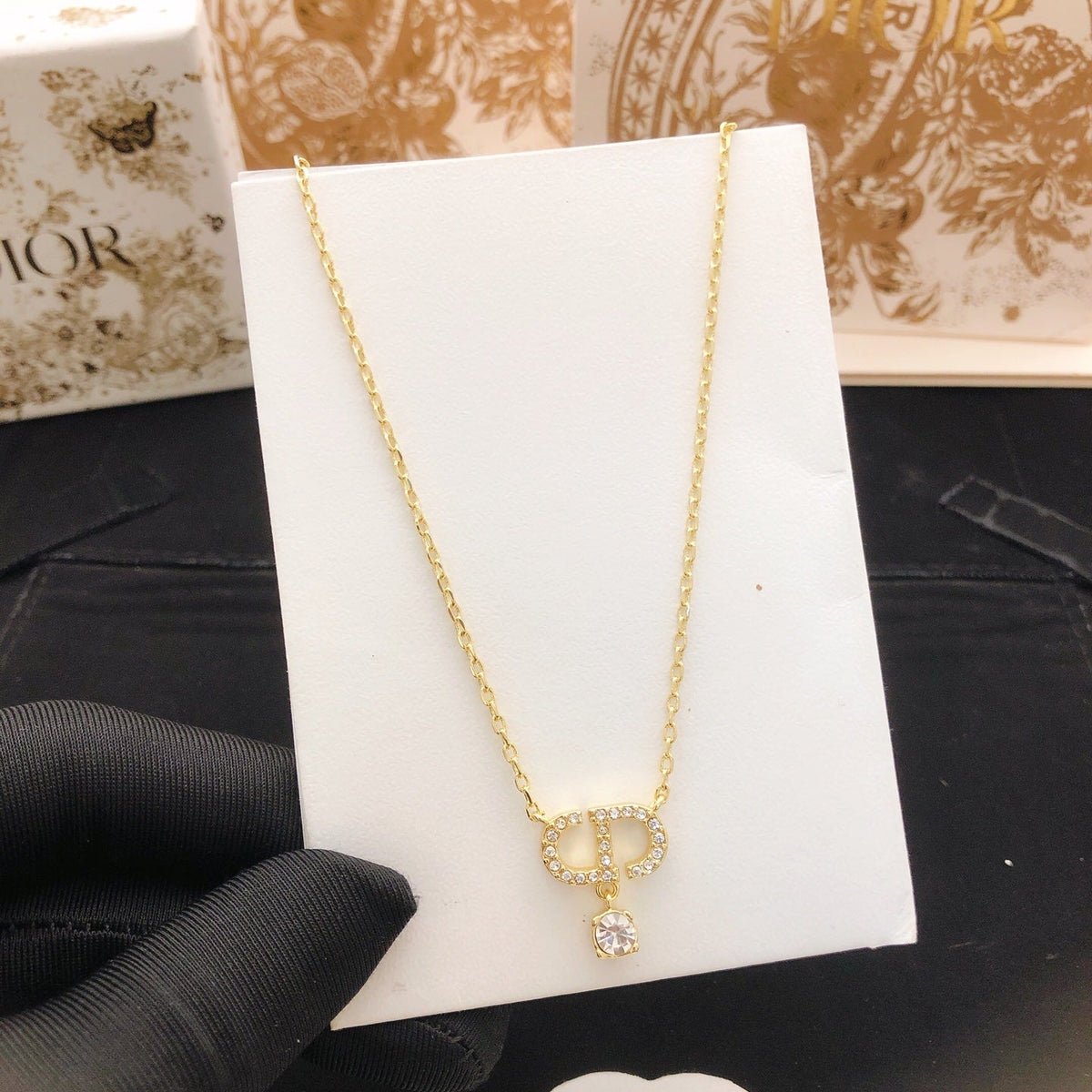 Martin Graham pendant necklace in polished metal-tone