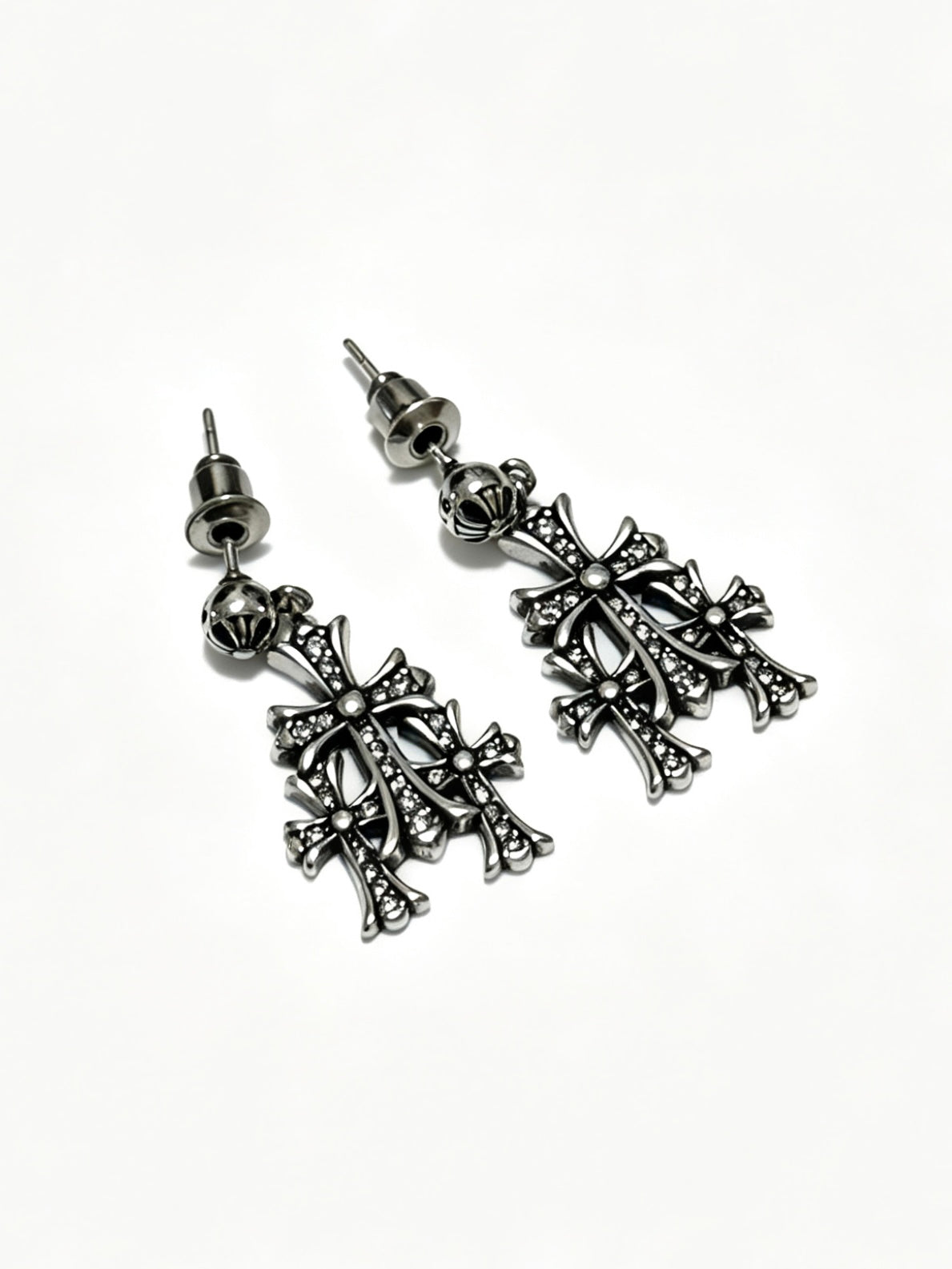 Martin Graham earrings in polished metal-tone – close-up detail