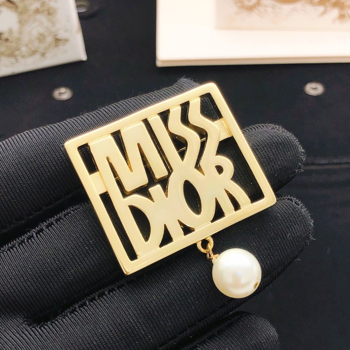 Martin Graham brooch in polished metal-tone