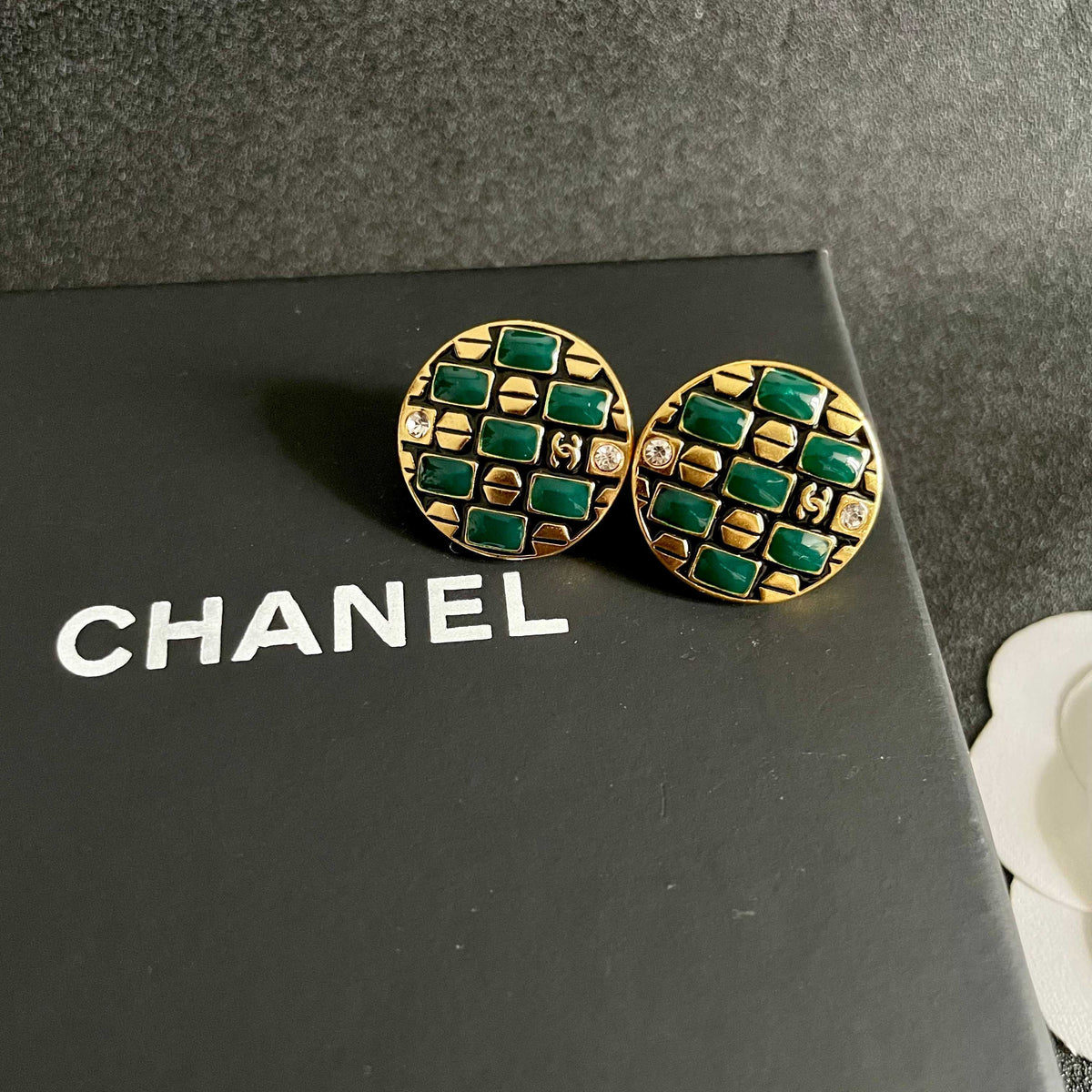 Martin Graham stud earrings in polished metal-tone – detail view