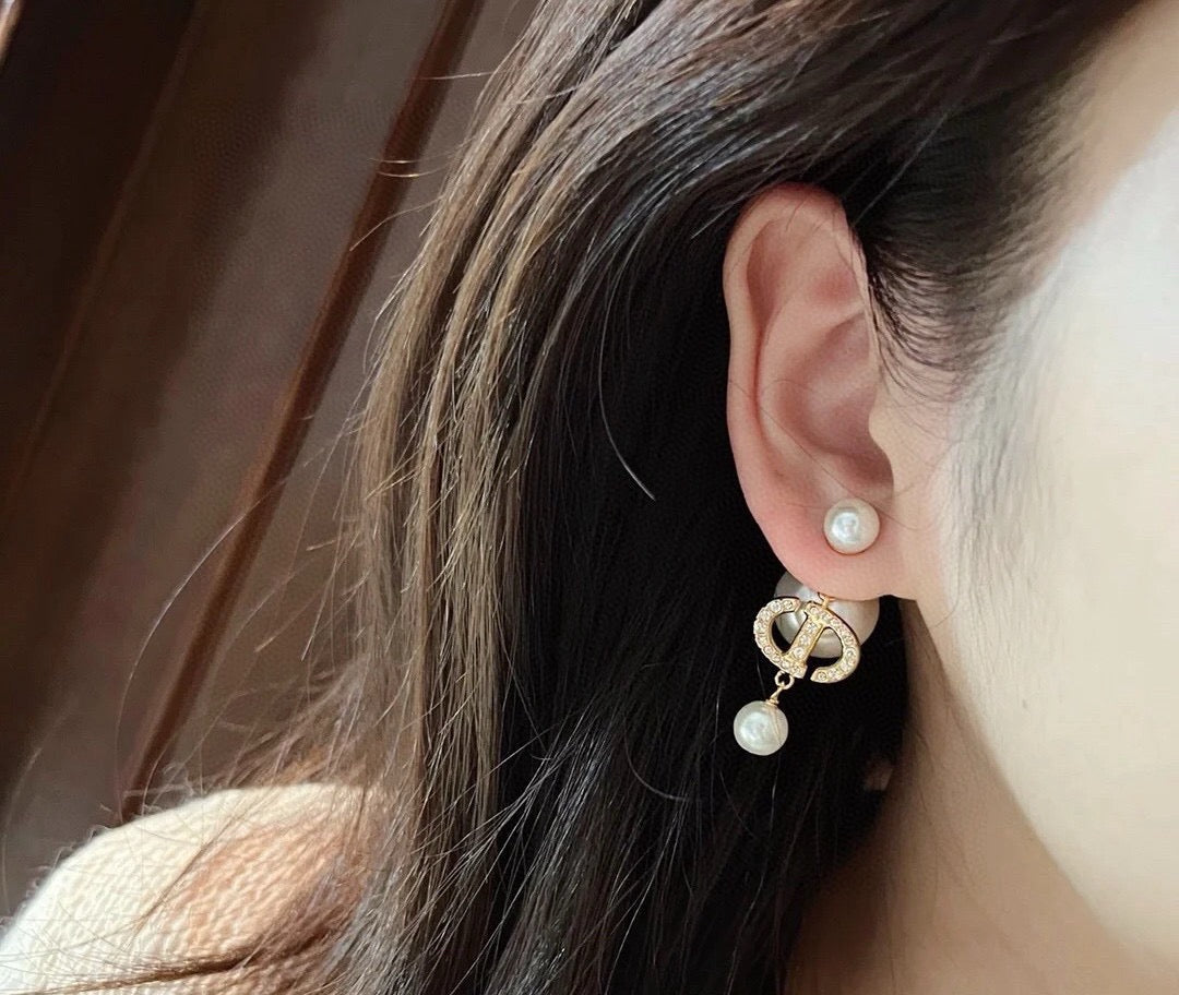 Martin Graham earrings in polished metal-tone