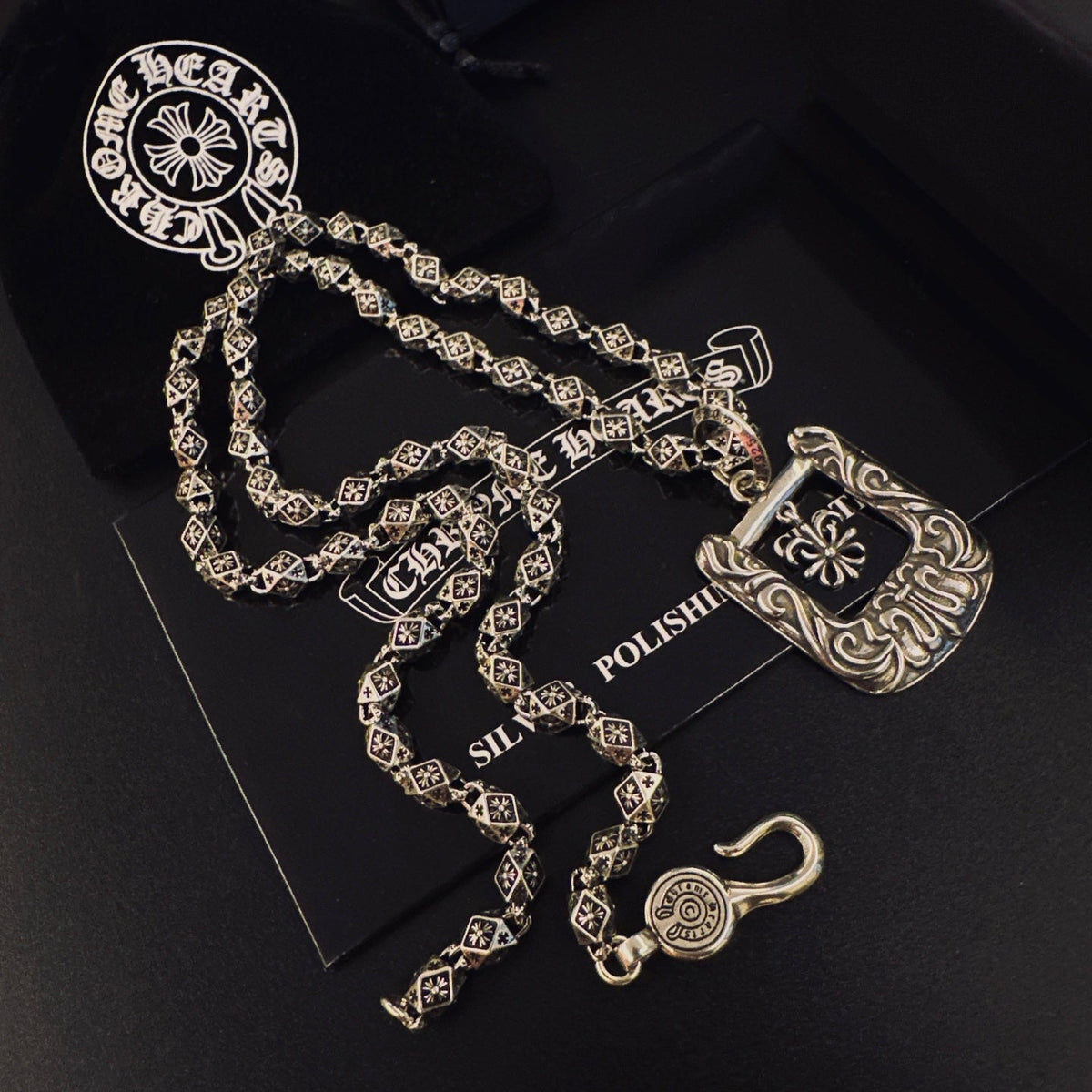 Martin Graham pendant necklace in polished metal-tone – close-up detail