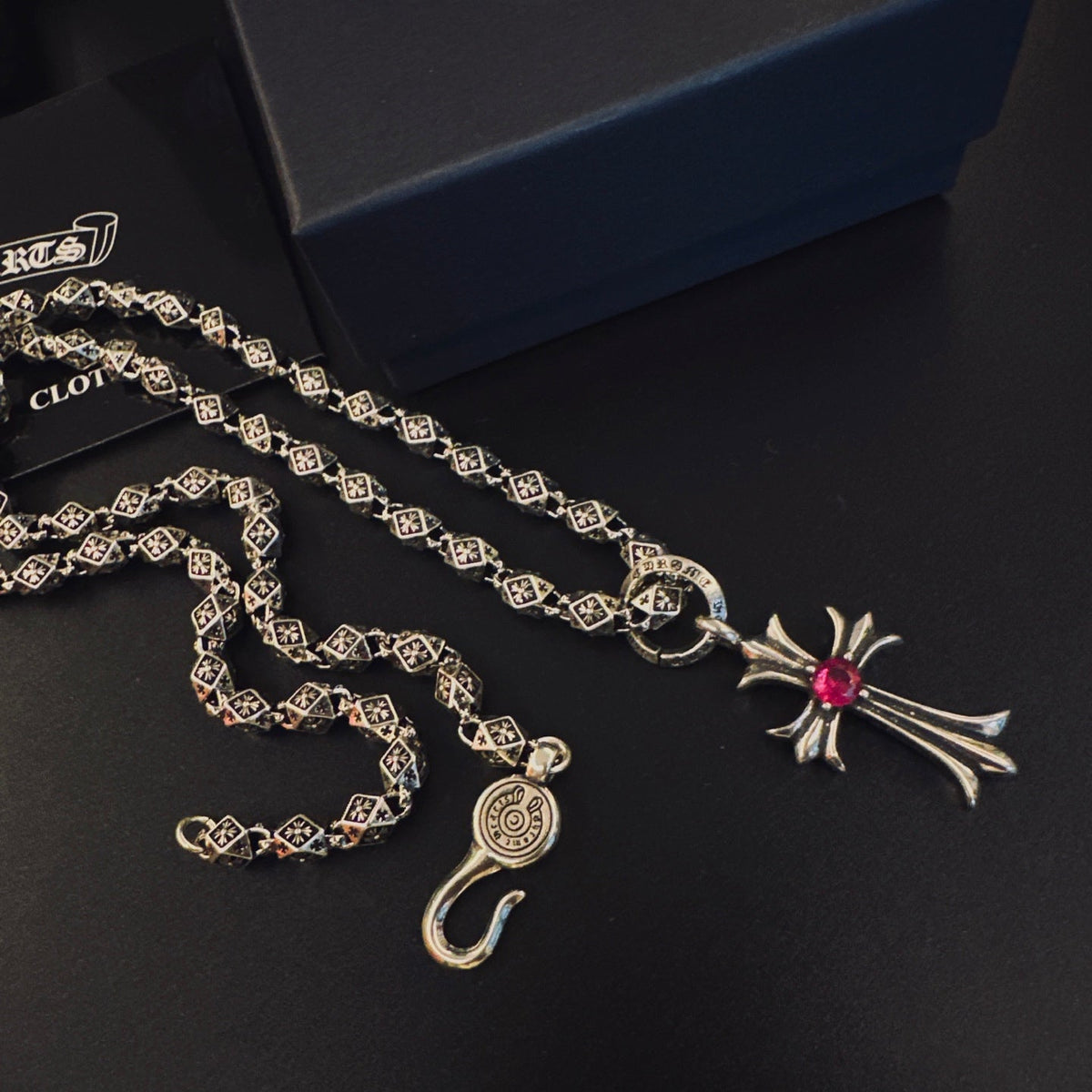 Martin Graham pendant necklace in polished metal-tone – close-up detail