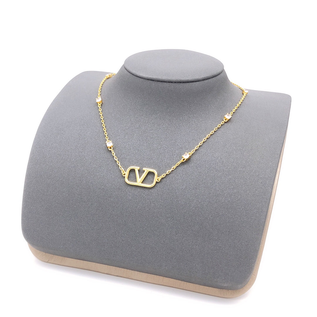 Martin Graham pendant necklace in polished metal-tone