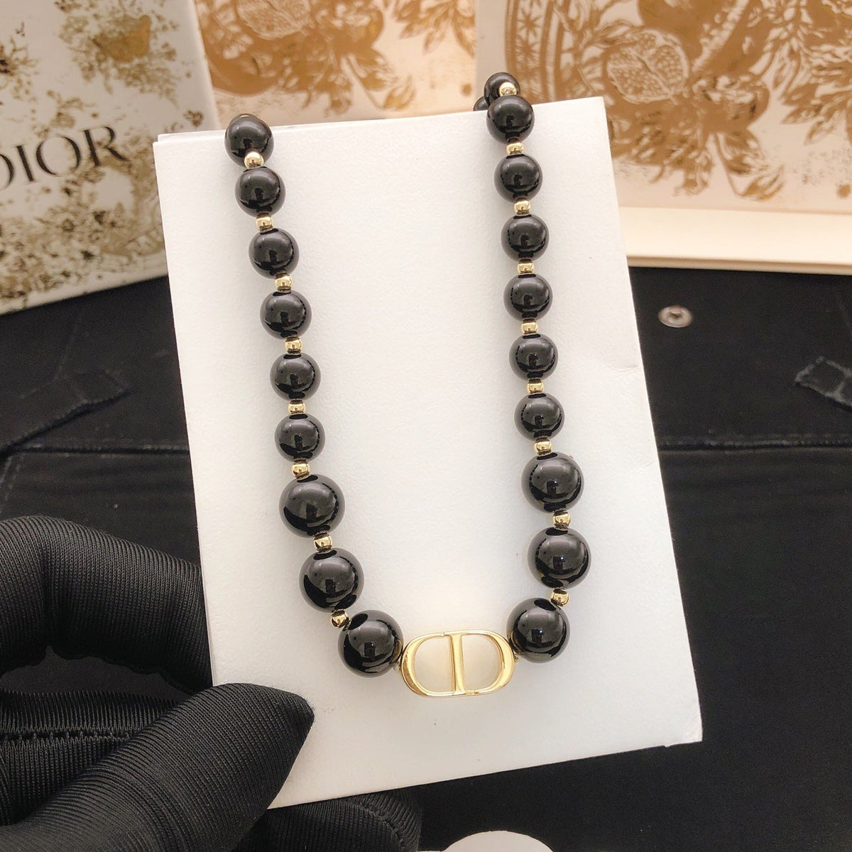 Martin Graham pendant necklace in polished metal-tone