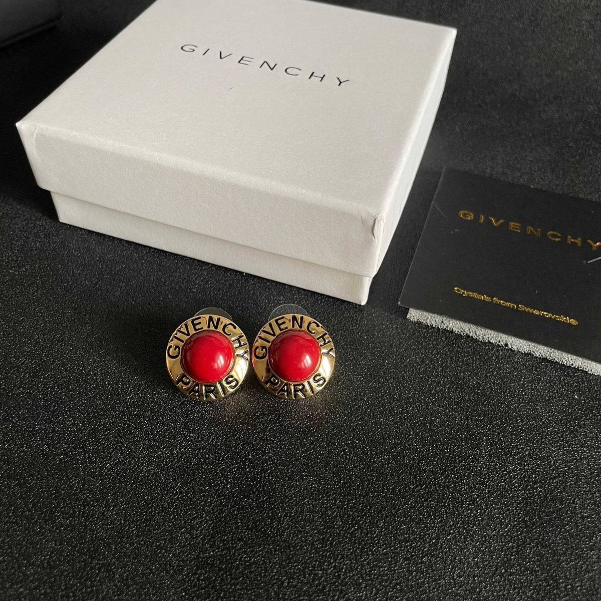 Martin Graham stud earrings in polished metal-tone