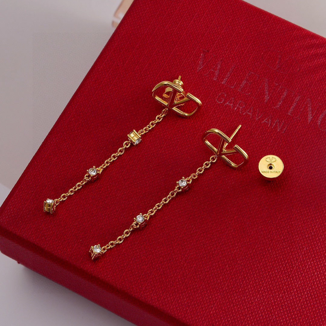 Martin Graham stud earrings in polished metal-tone