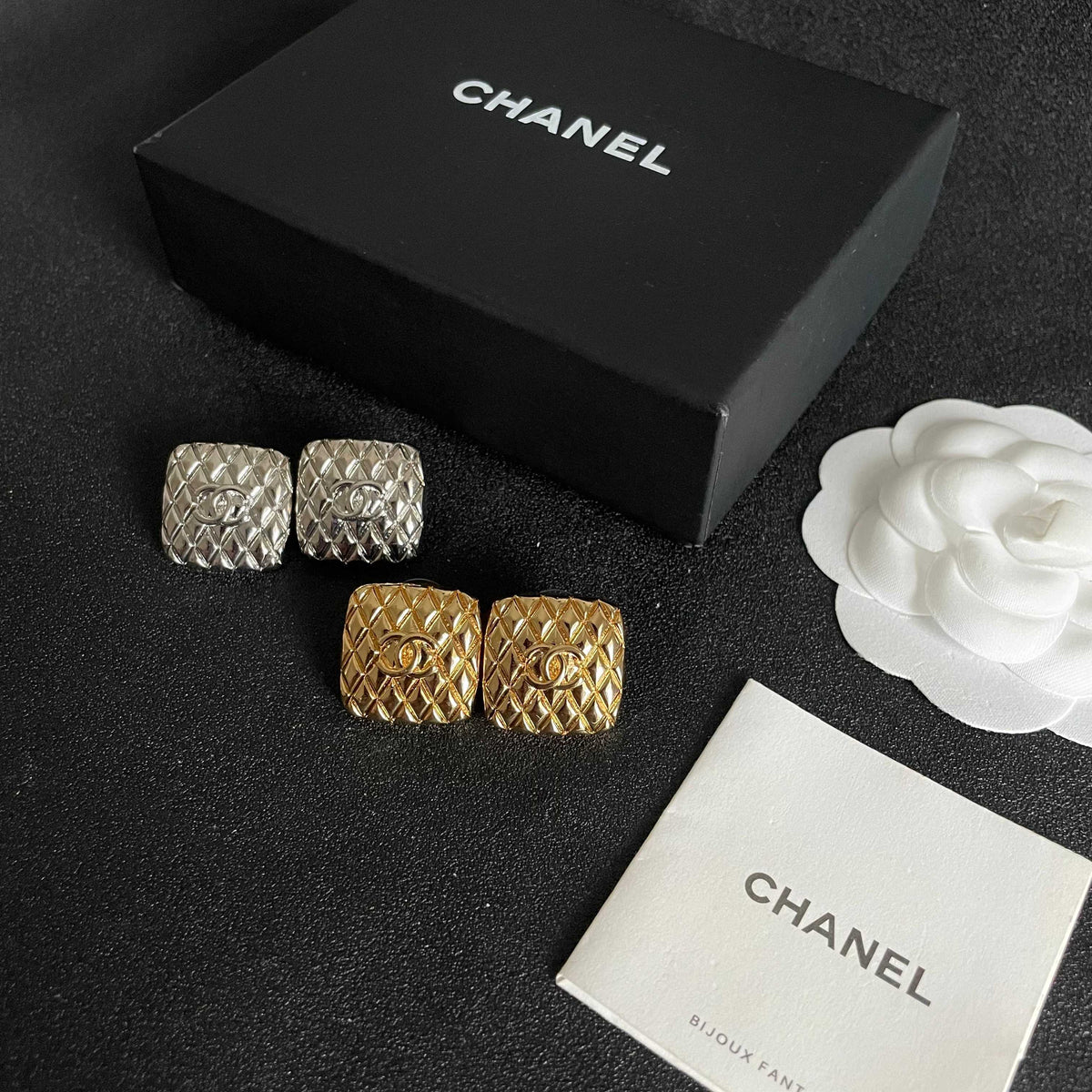 Martin Graham stud earrings in polished metal-tone – close-up detail