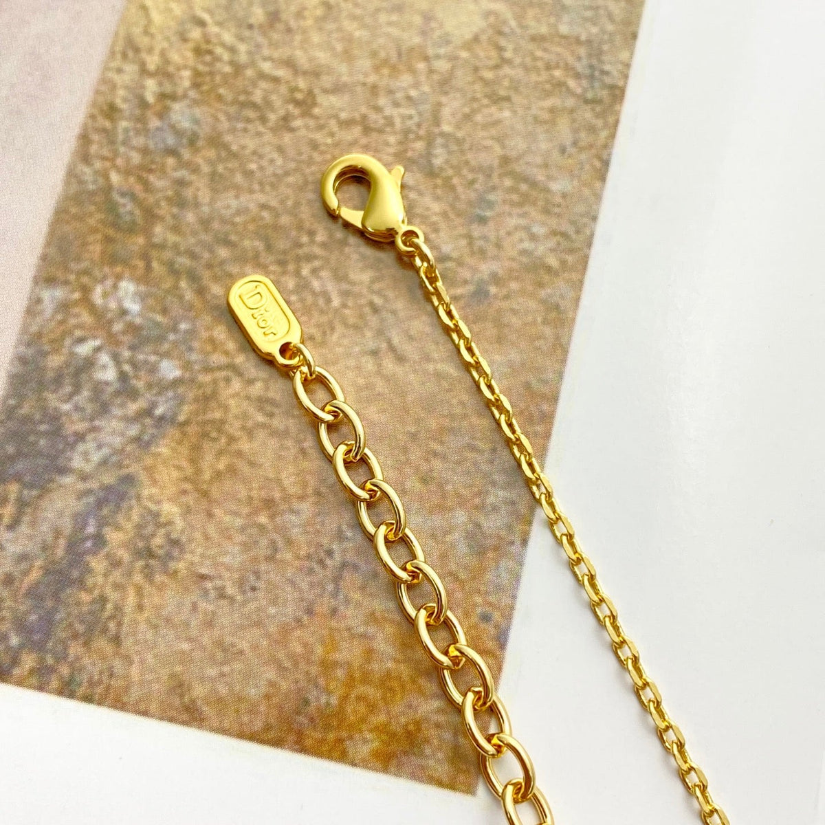 Martin Graham pendant necklace in polished metal-tone