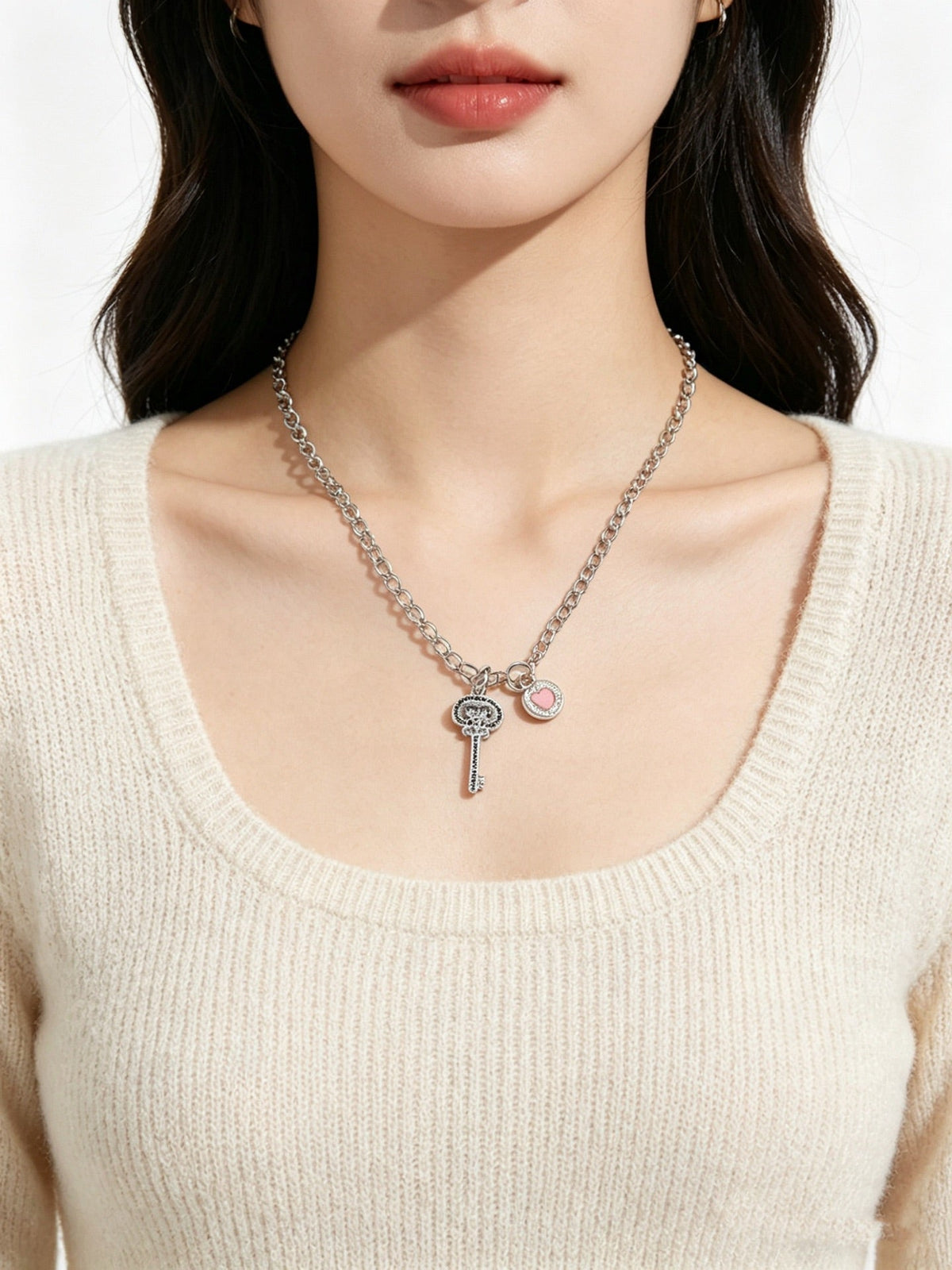 Martin Graham pendant necklace in polished metal-tone – close-up detail