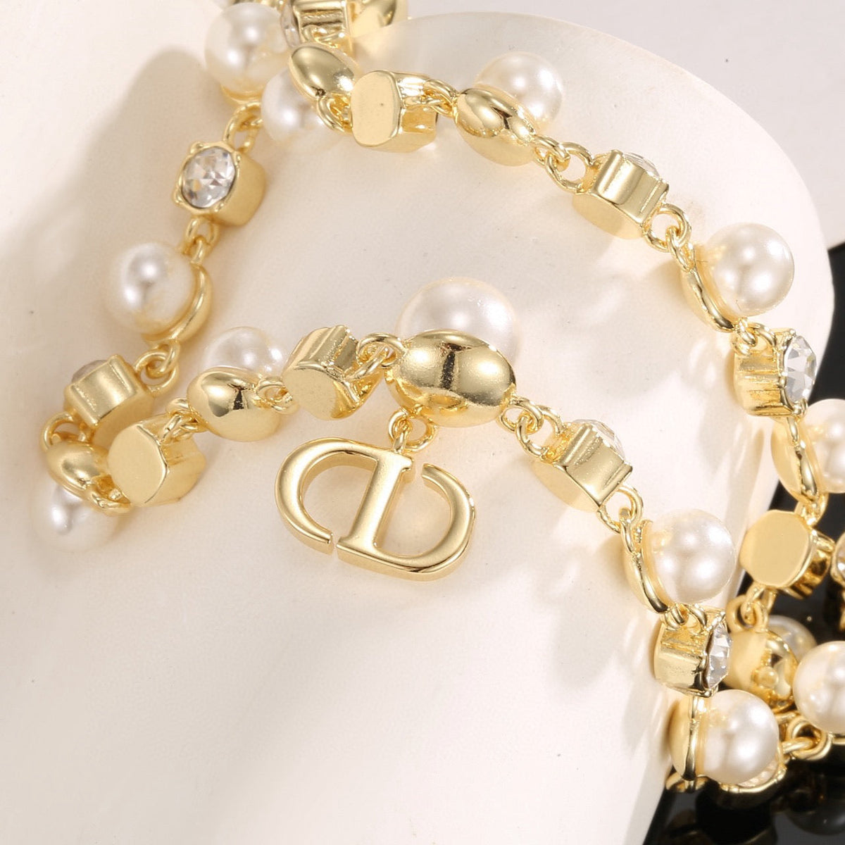 Martin Graham pendant necklace in polished metal-tone