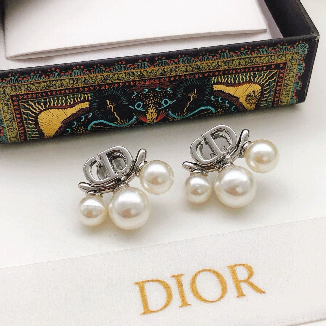 Martin Graham stud earrings in polished metal-tone