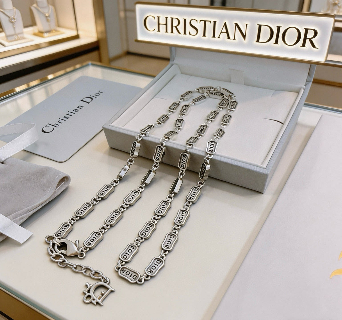 Martin Graham pendant necklace in polished metal-tone