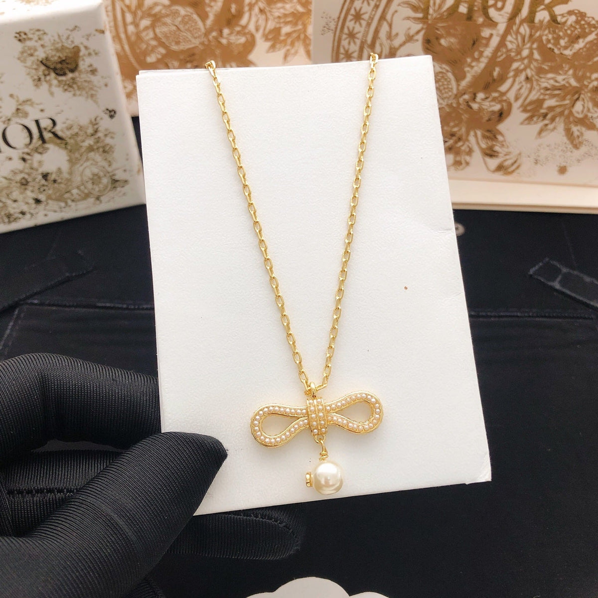Martin Graham pendant necklace in polished metal-tone