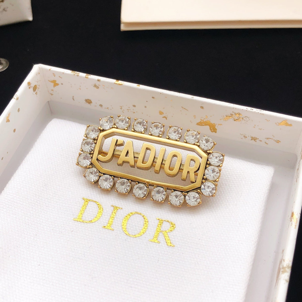 Martin Graham brooch in polished metal-tone