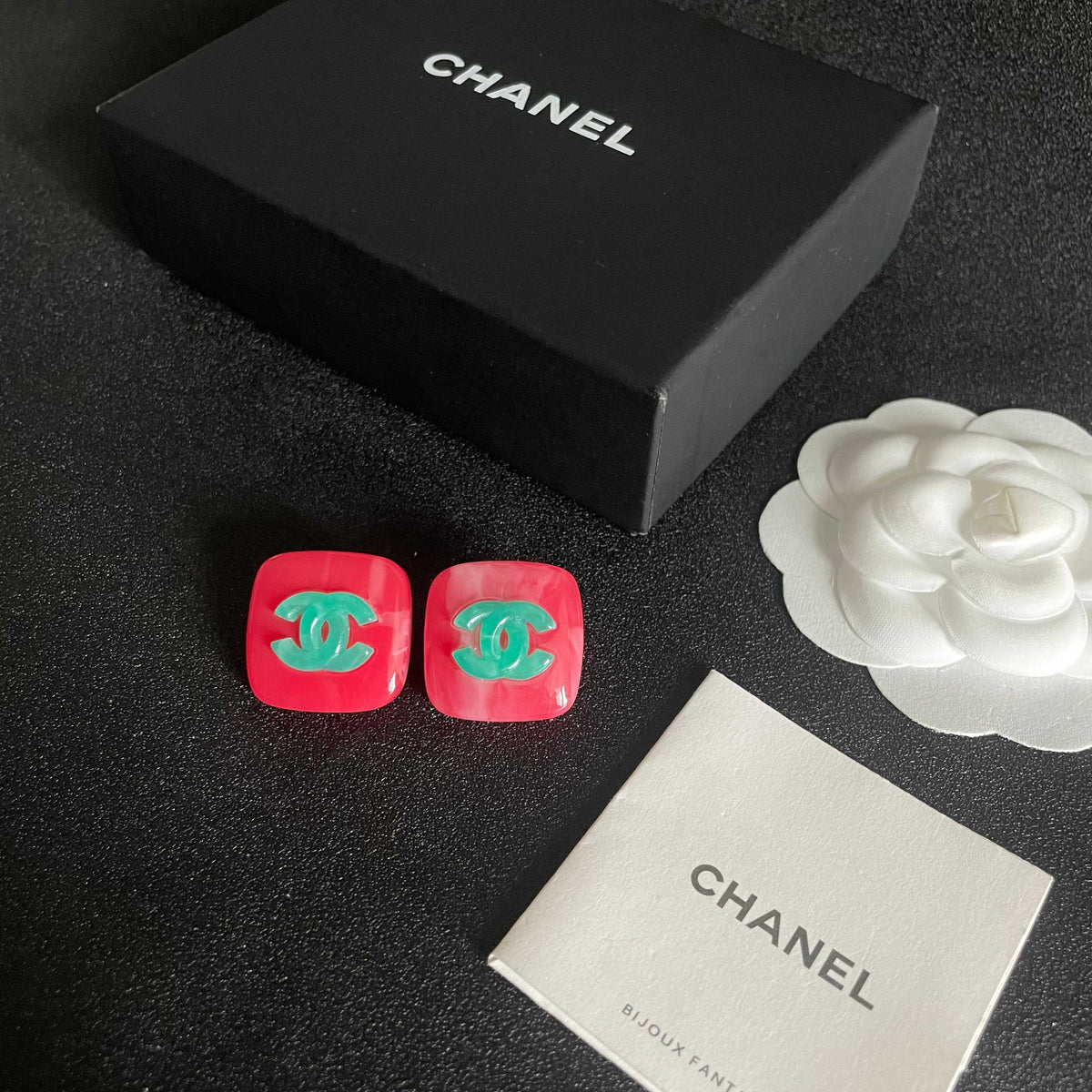 Martin Graham stud earrings in polished metal-tone – close-up detail