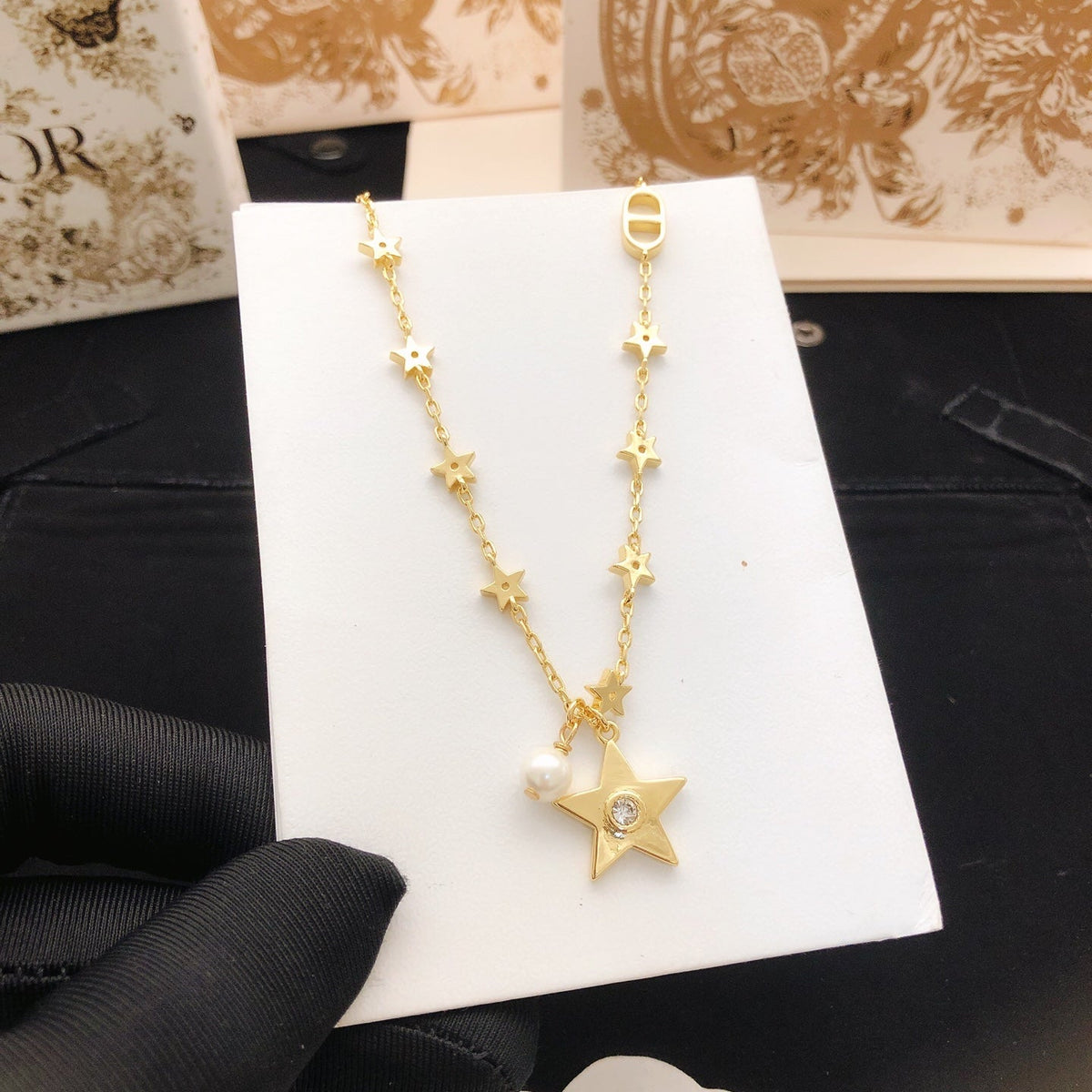 Martin Graham pendant necklace in polished metal-tone