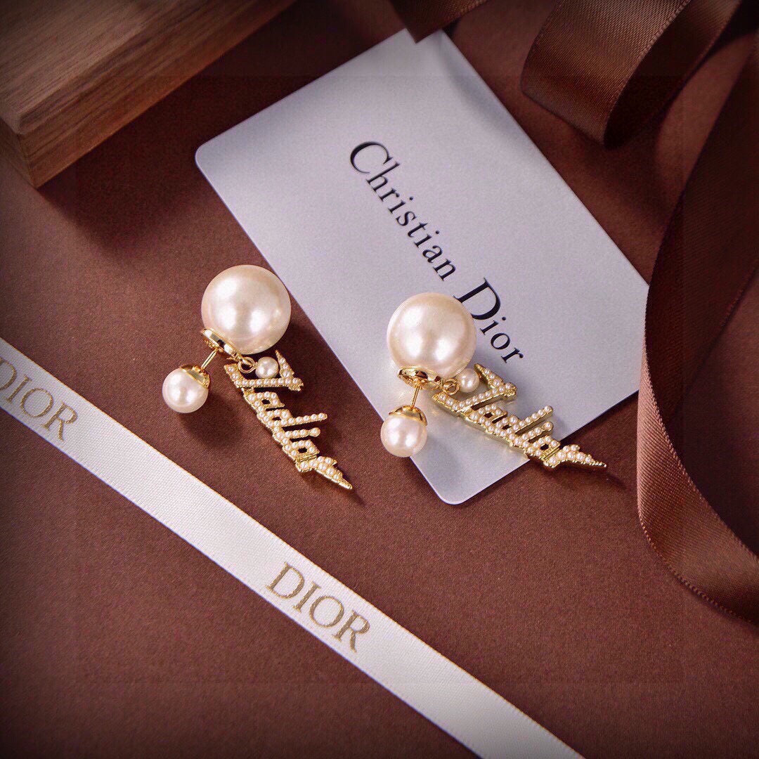 Martin Graham earrings in polished metal-tone