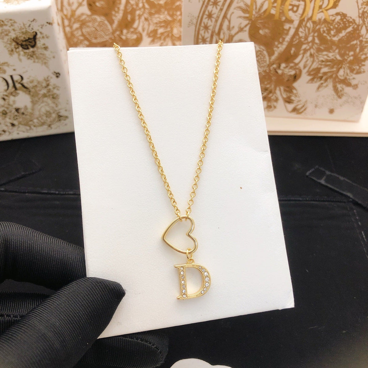 Martin Graham pendant necklace in polished metal-tone