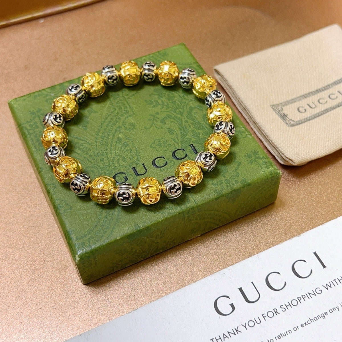 Martin Graham bracelet in polished metal-tone – close-up detail