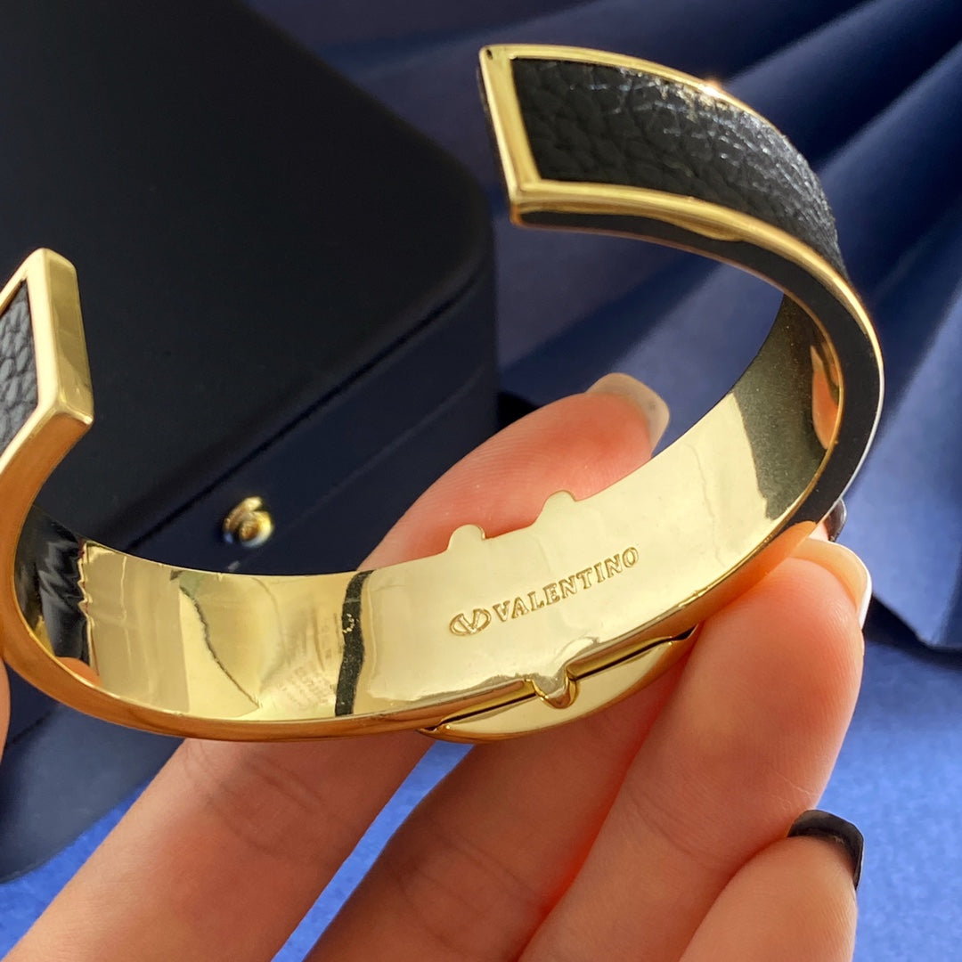Martin Graham cuff bracelet in polished metal-tone