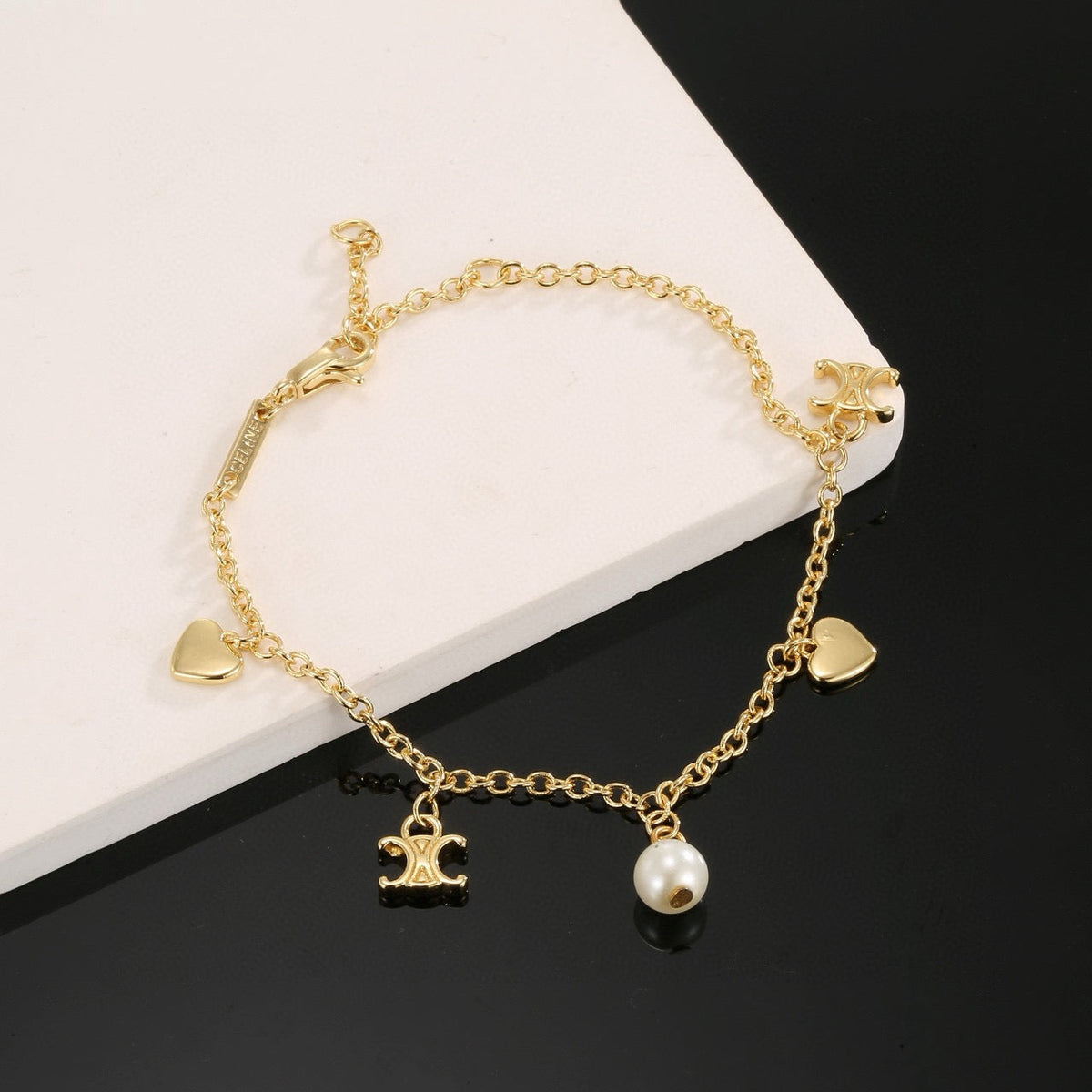 Martin Graham bracelet in polished metal-tone