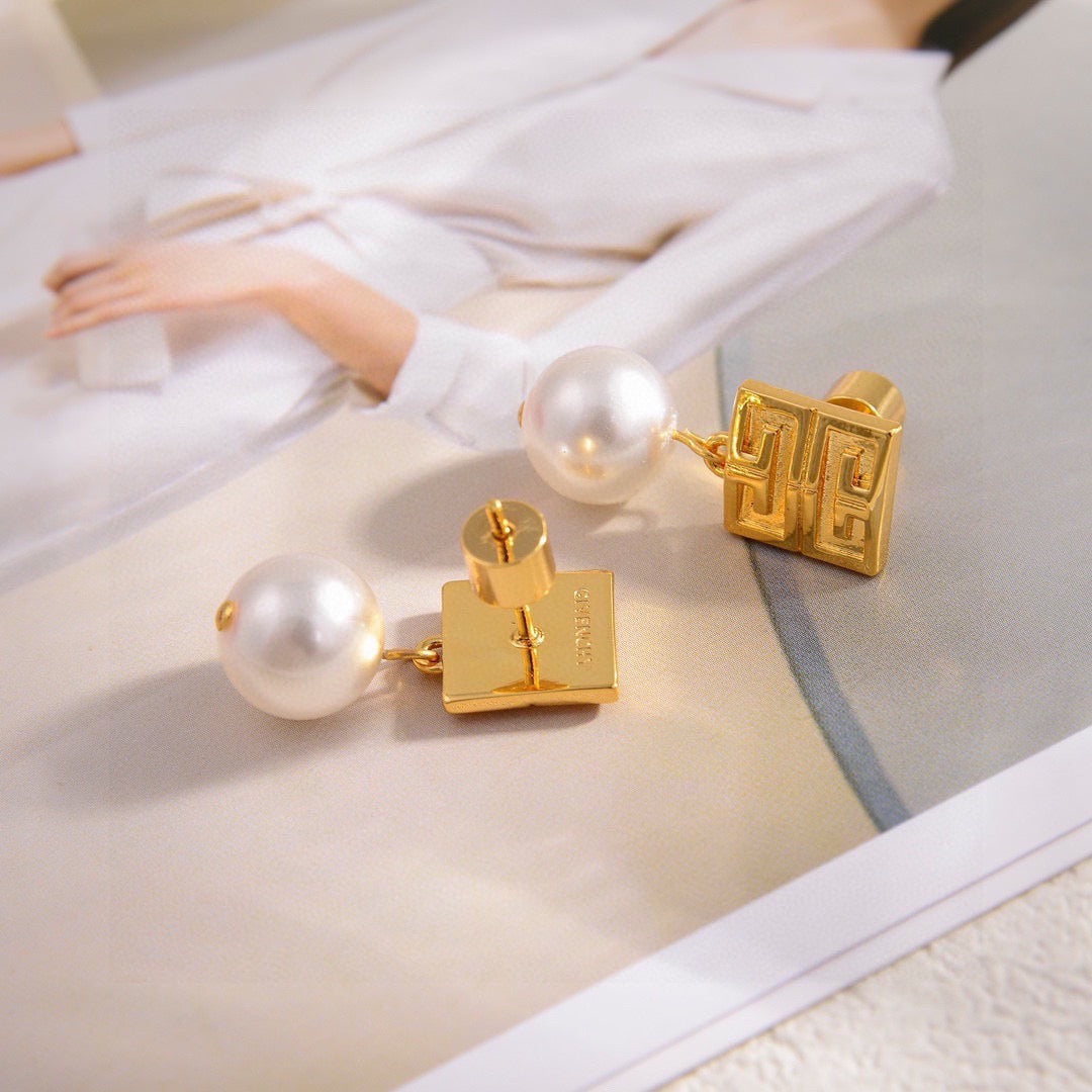 Martin Graham stud earrings in polished metal-tone