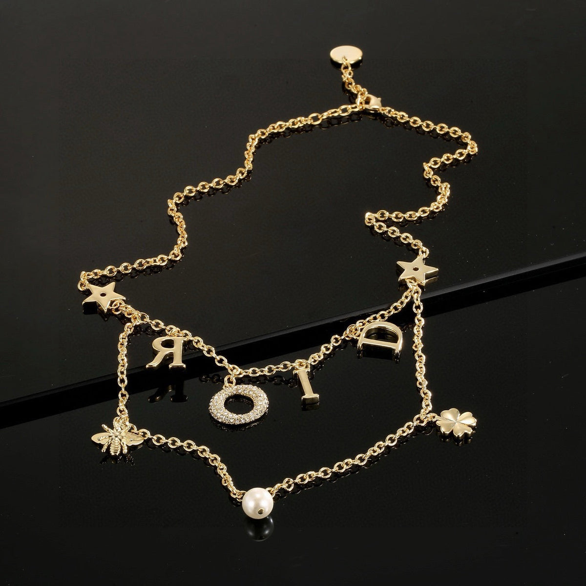 Martin Graham pendant necklace in polished metal-tone