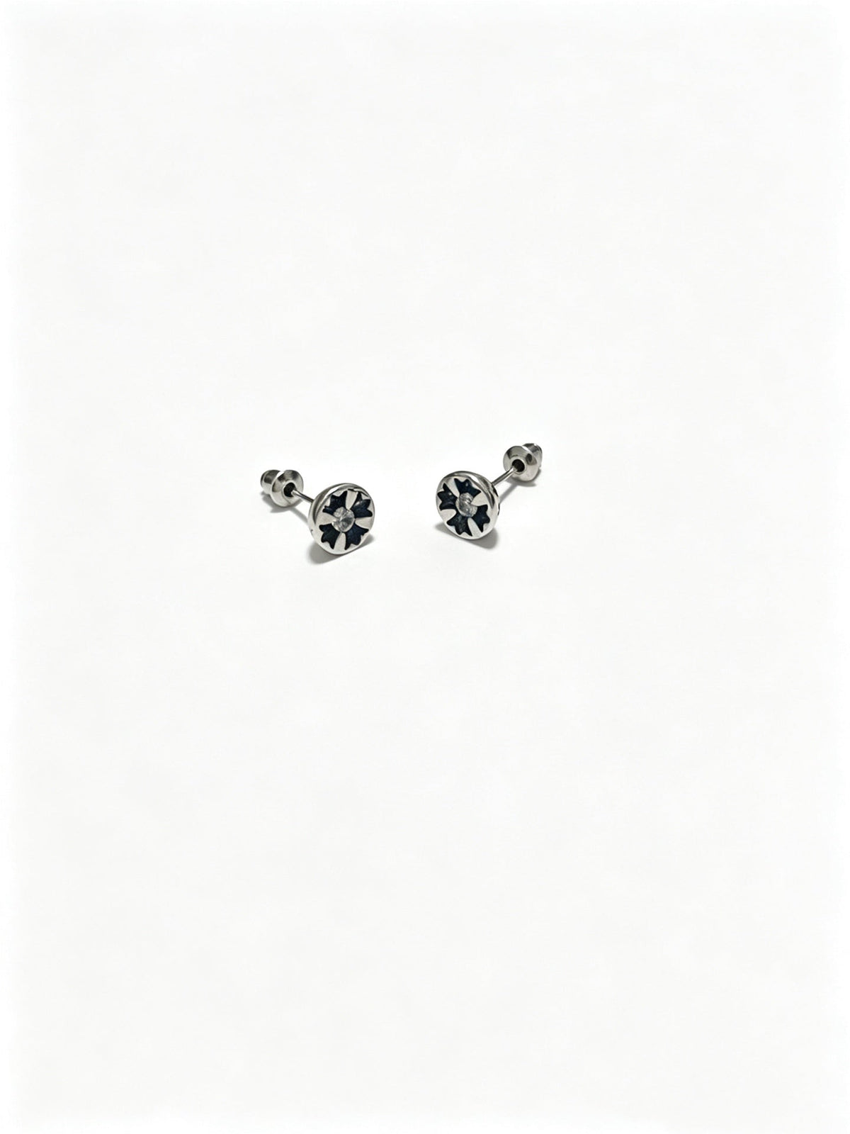 Martin Graham earrings in polished metal-tone – close-up detail