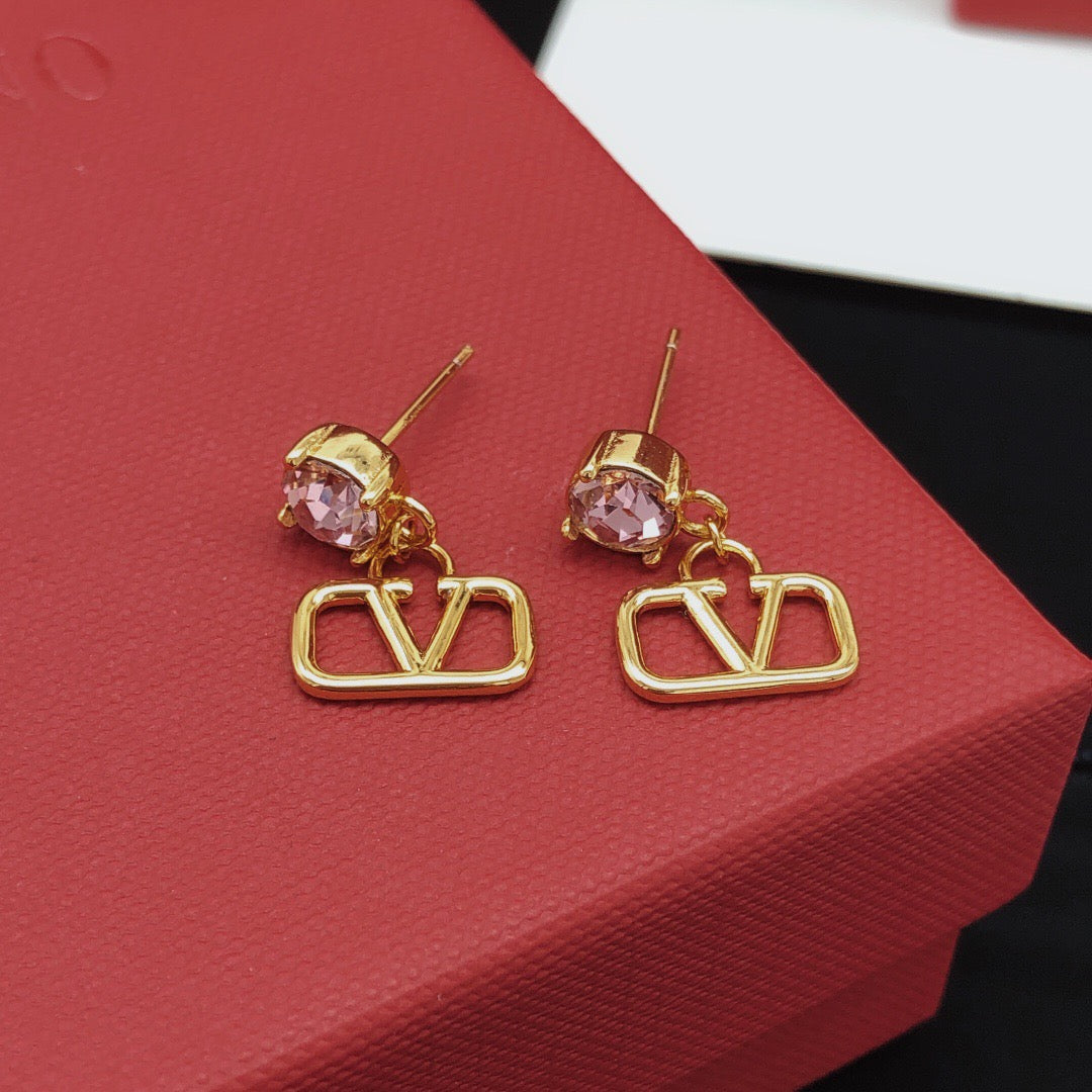 Martin Graham stud earrings in polished metal-tone