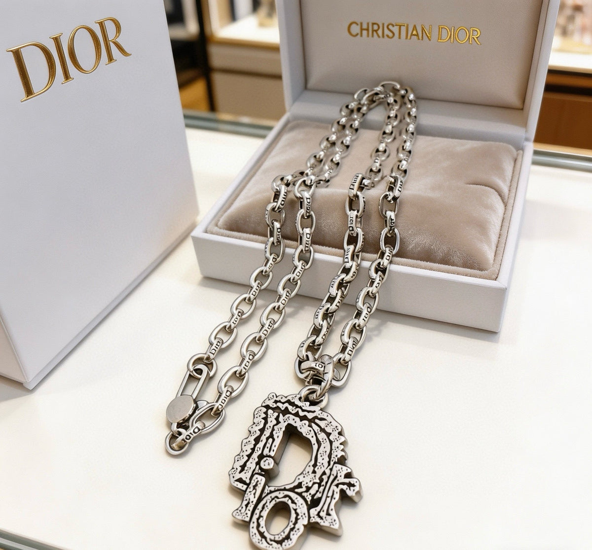 Martin Graham pendant necklace in polished metal-tone