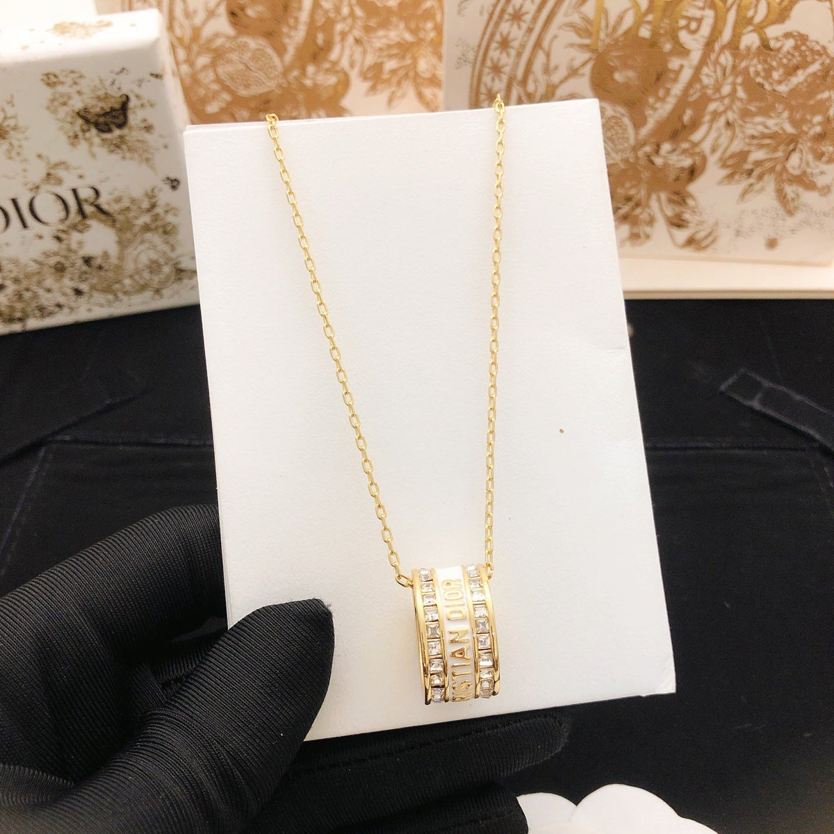 Martin Graham pendant necklace in polished metal-tone