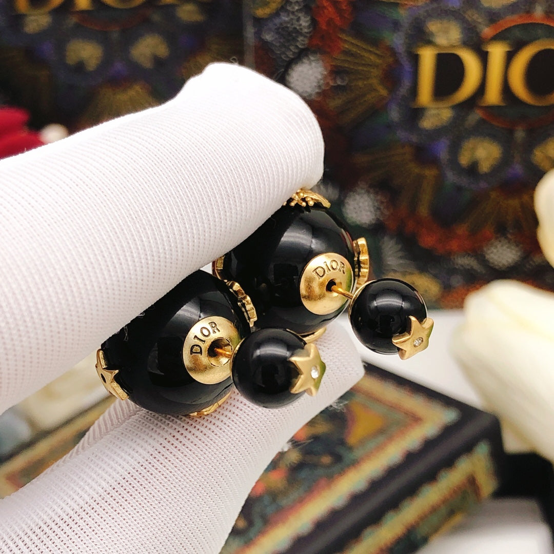 Martin Graham stud earrings in polished metal-tone