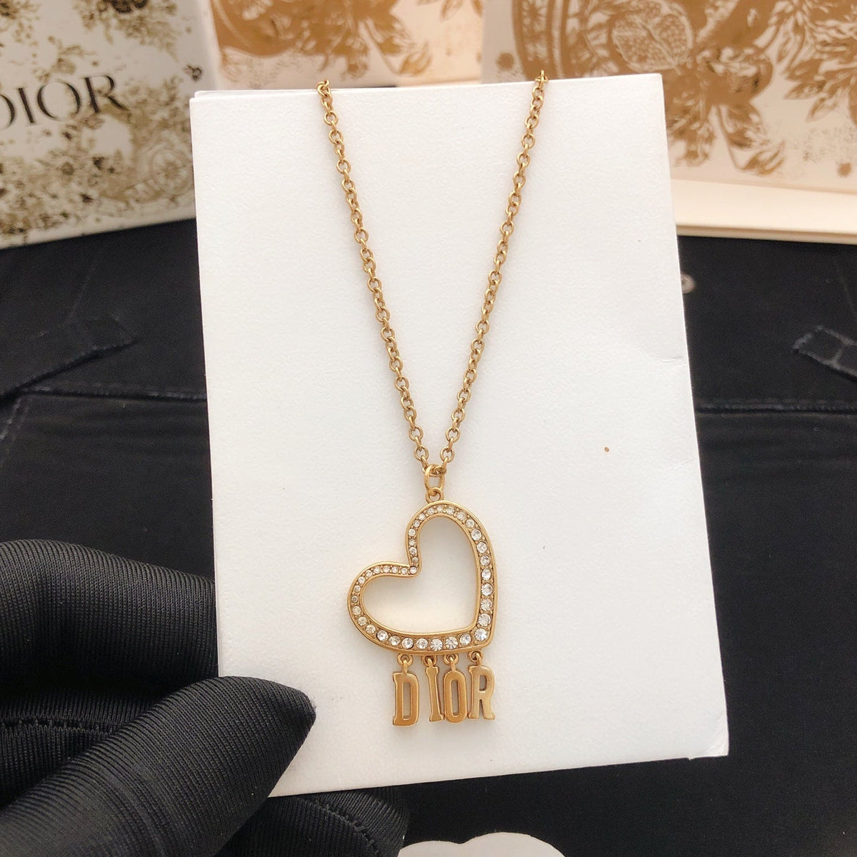 Martin Graham pendant necklace in polished metal-tone