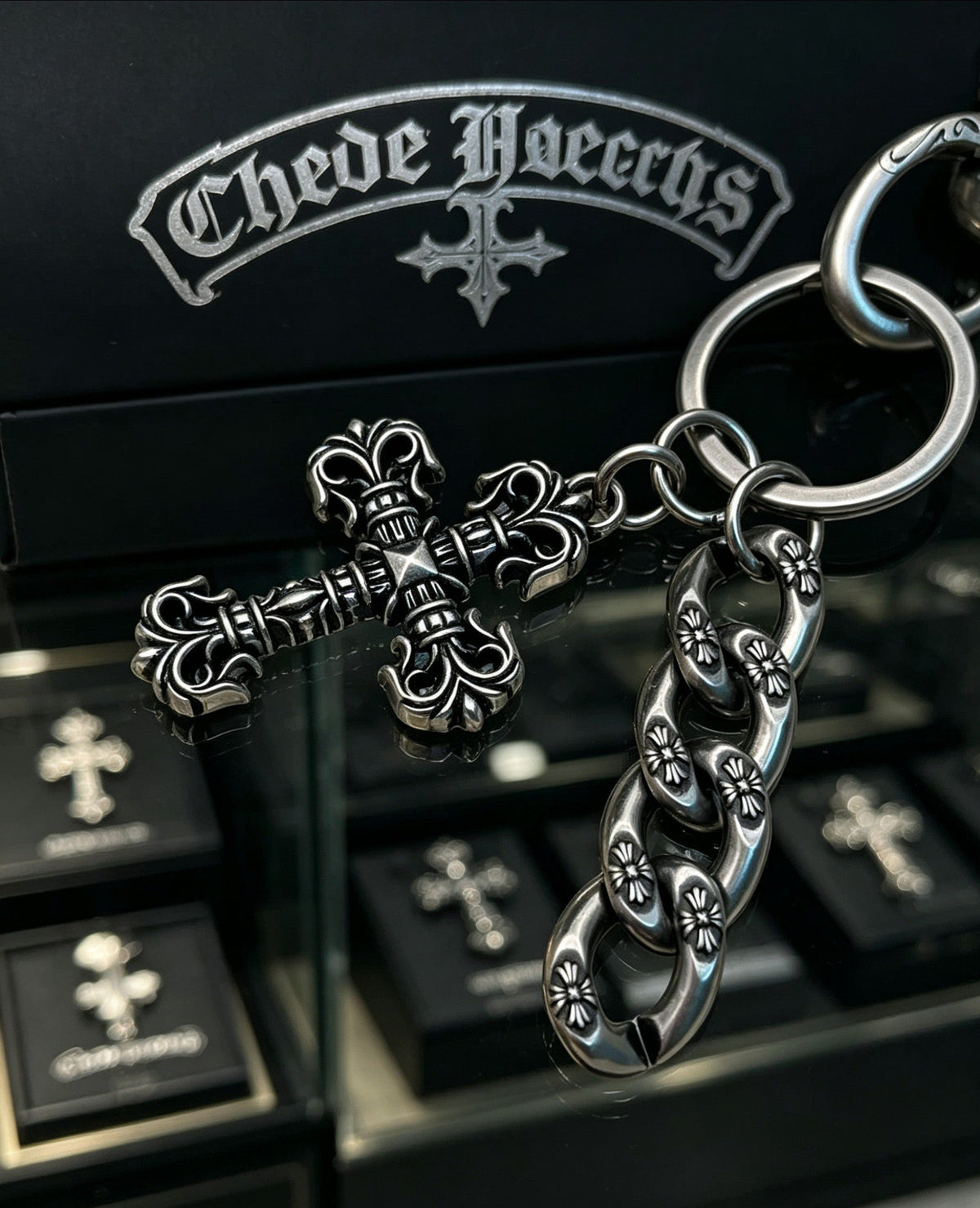 Martin Graham chain accessory in polished metal-tone – close-up detail