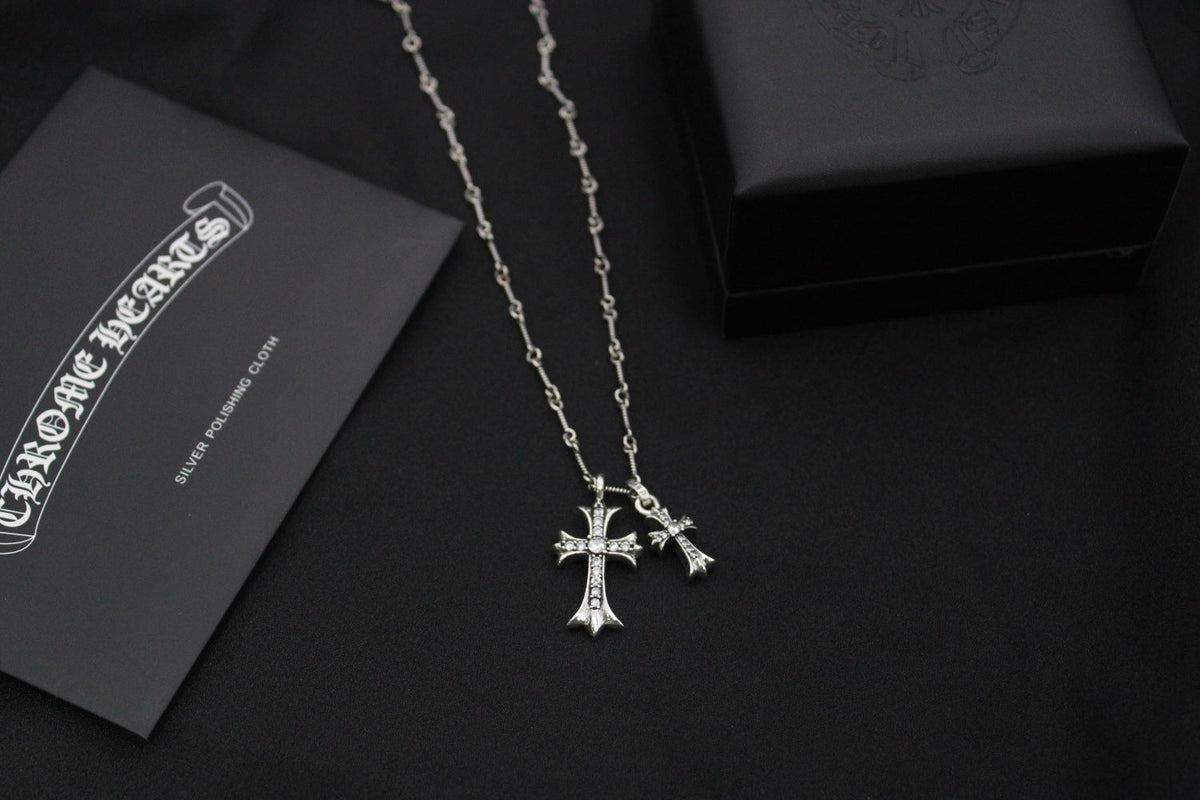 Martin Graham pendant necklace in polished metal-tone – close-up detail