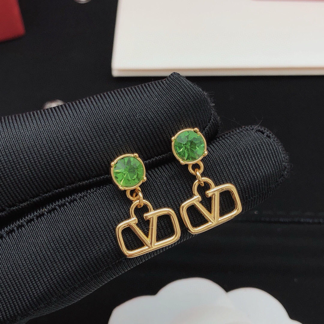 Martin Graham stud earrings in polished metal-tone