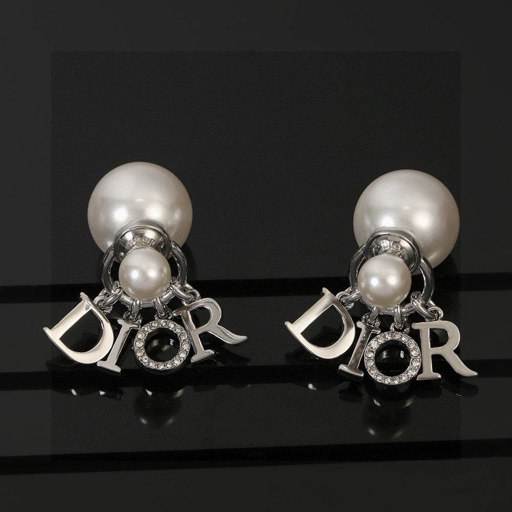 Martin Graham earrings in polished metal-tone