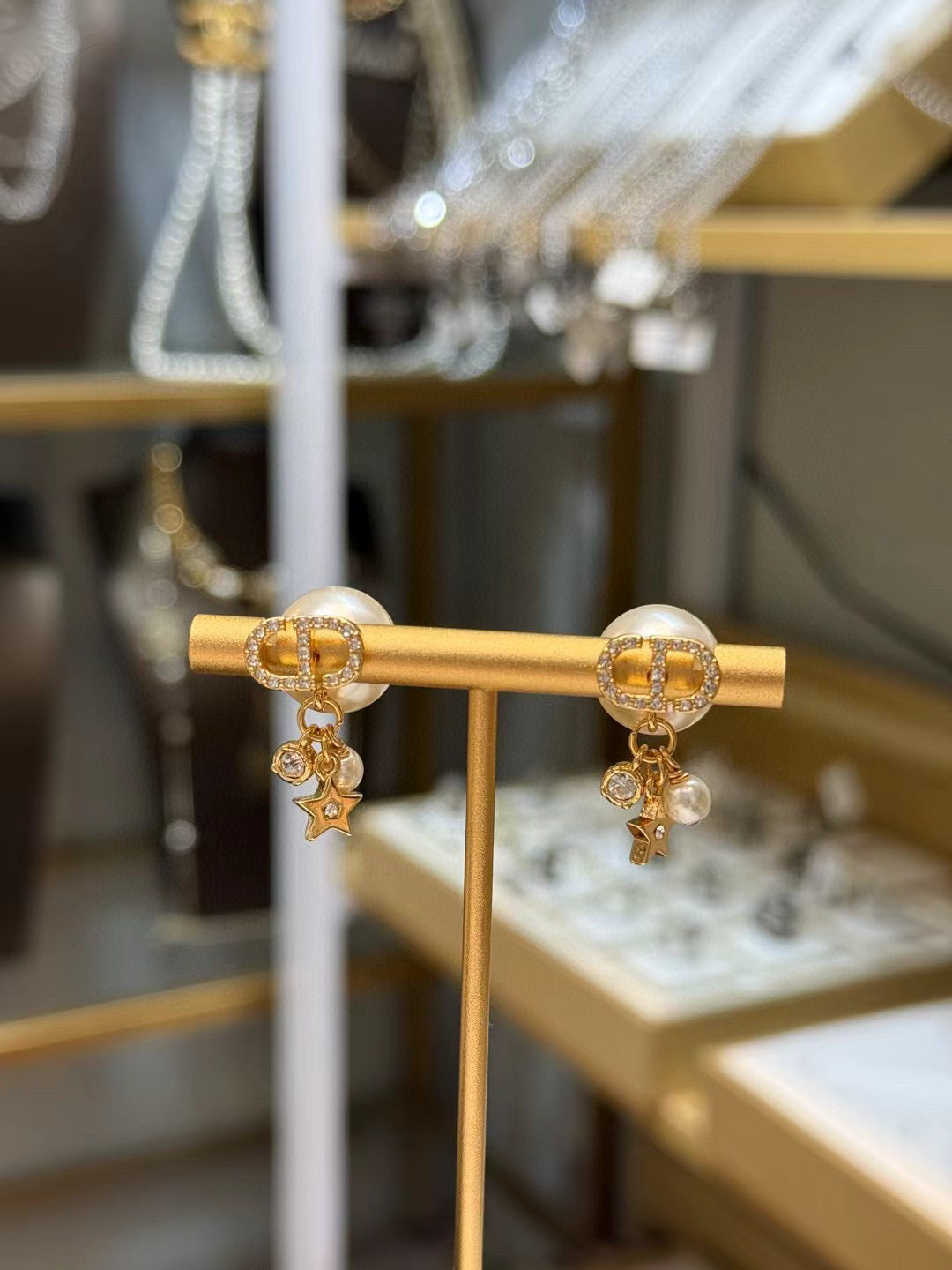 Martin Graham earrings in polished metal-tone