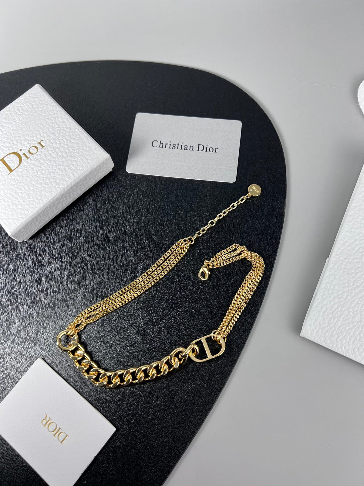Martin Graham pendant necklace in polished metal-tone