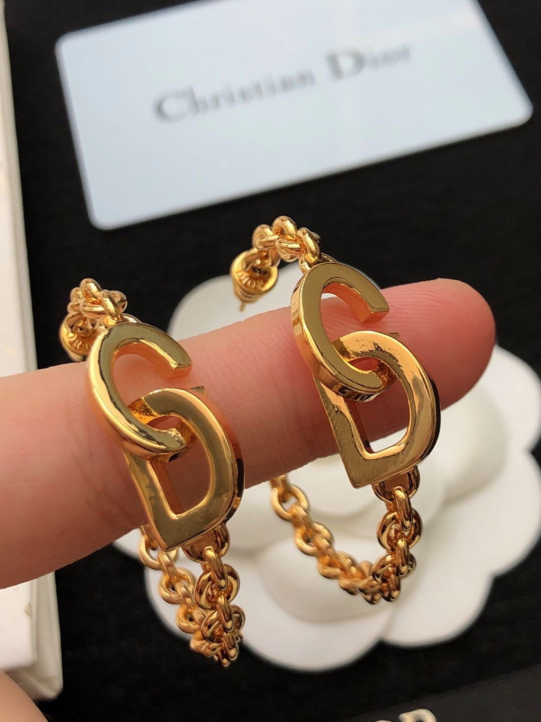 Martin Graham earrings in polished metal-tone